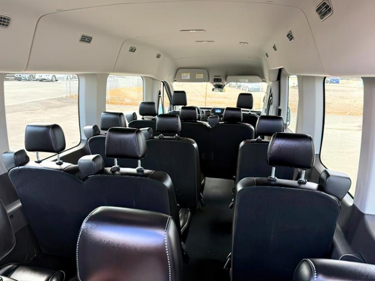 2021 Oxford White /Ebony Ford Transit-350 Passenger Van (1FBAX9C83MK) with an EcoBoost 35L V-6 gasoline direct injection engine, Automatic transmission, located at 1175 N Woodruff Ave, Idaho Falls, ID, 83401, 43.506901, -111.999657 - At Timberline Auto, finding a great deal on your next vehicle is always easy! Our experienced sales staff's goal is to help find you the right vehicle at the right price! Our knowledgeable finance department has options for almost any credit score. We offer extended service contract options to prote - Photo#5