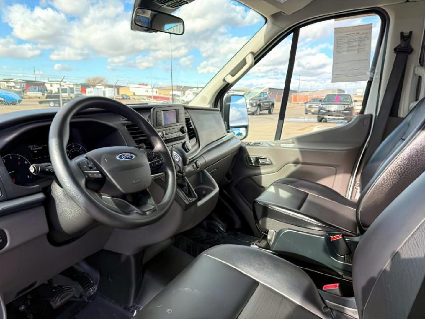 2021 Oxford White /Ebony Ford Transit-350 Passenger Van (1FBAX9C83MK) with an EcoBoost 35L V-6 gasoline direct injection engine, Automatic transmission, located at 1175 N Woodruff Ave, Idaho Falls, ID, 83401, 43.506901, -111.999657 - At Timberline Auto, finding a great deal on your next vehicle is always easy! Our experienced sales staff's goal is to help find you the right vehicle at the right price! Our knowledgeable finance department has options for almost any credit score. We offer extended service contract options to prote - Photo#13
