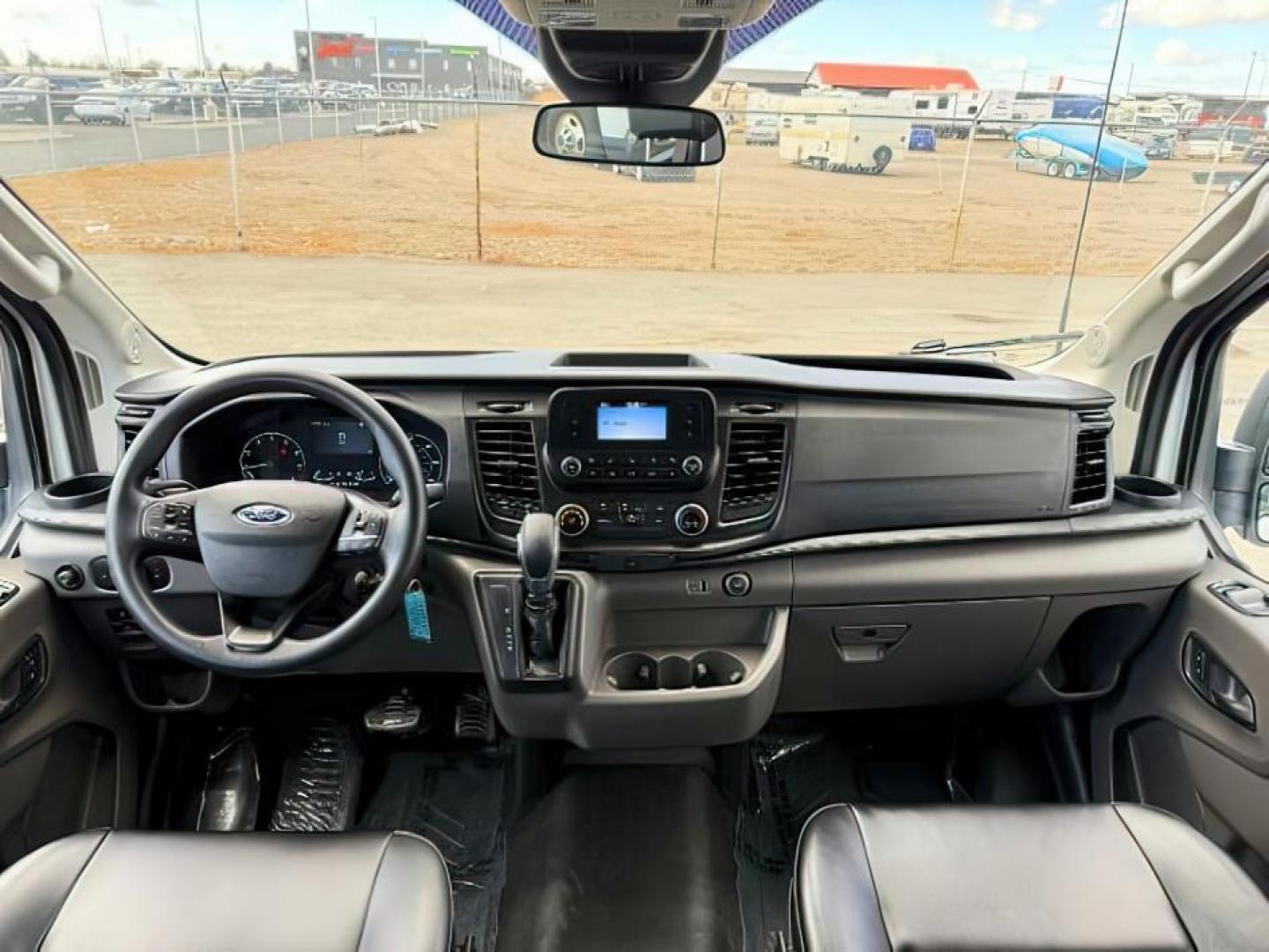 2021 Oxford White /Ebony Ford Transit-350 Passenger Van (1FBAX9C83MK) with an EcoBoost 35L V-6 gasoline direct injection engine, Automatic transmission, located at 1175 N Woodruff Ave, Idaho Falls, ID, 83401, 43.506901, -111.999657 - At Timberline Auto, finding a great deal on your next vehicle is always easy! Our experienced sales staff's goal is to help find you the right vehicle at the right price! Our knowledgeable finance department has options for almost any credit score. We offer extended service contract options to prote - Photo#19