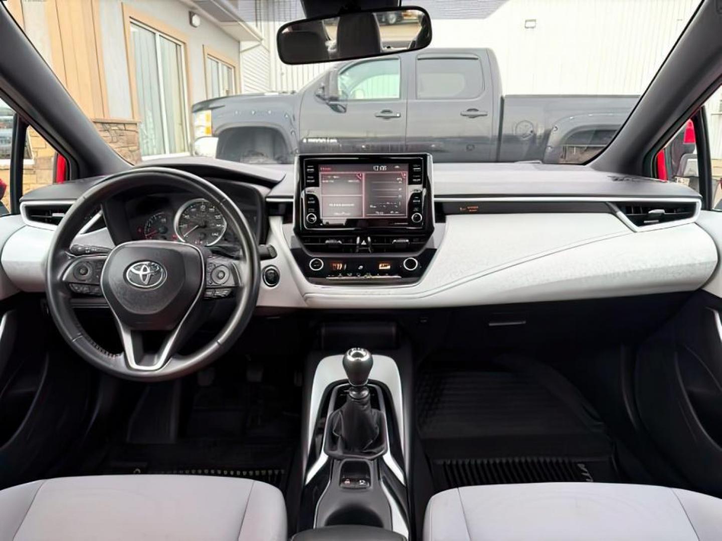 2021 RED /CLOTH Toyota Corolla (5YFM4MCE4MP) with an 20 I4 engine, Manual transmission, located at 1175 N Woodruff Ave, Idaho Falls, ID, 83401, 43.506901, -111.999657 - At Timberline Auto, finding a great deal on your next vehicle is always easy! Our experienced sales staff's goal is to help find you the right vehicle at the right price! Our knowledgeable finance department has options for almost any credit score. We offer extended service contract options to prote - Photo#19