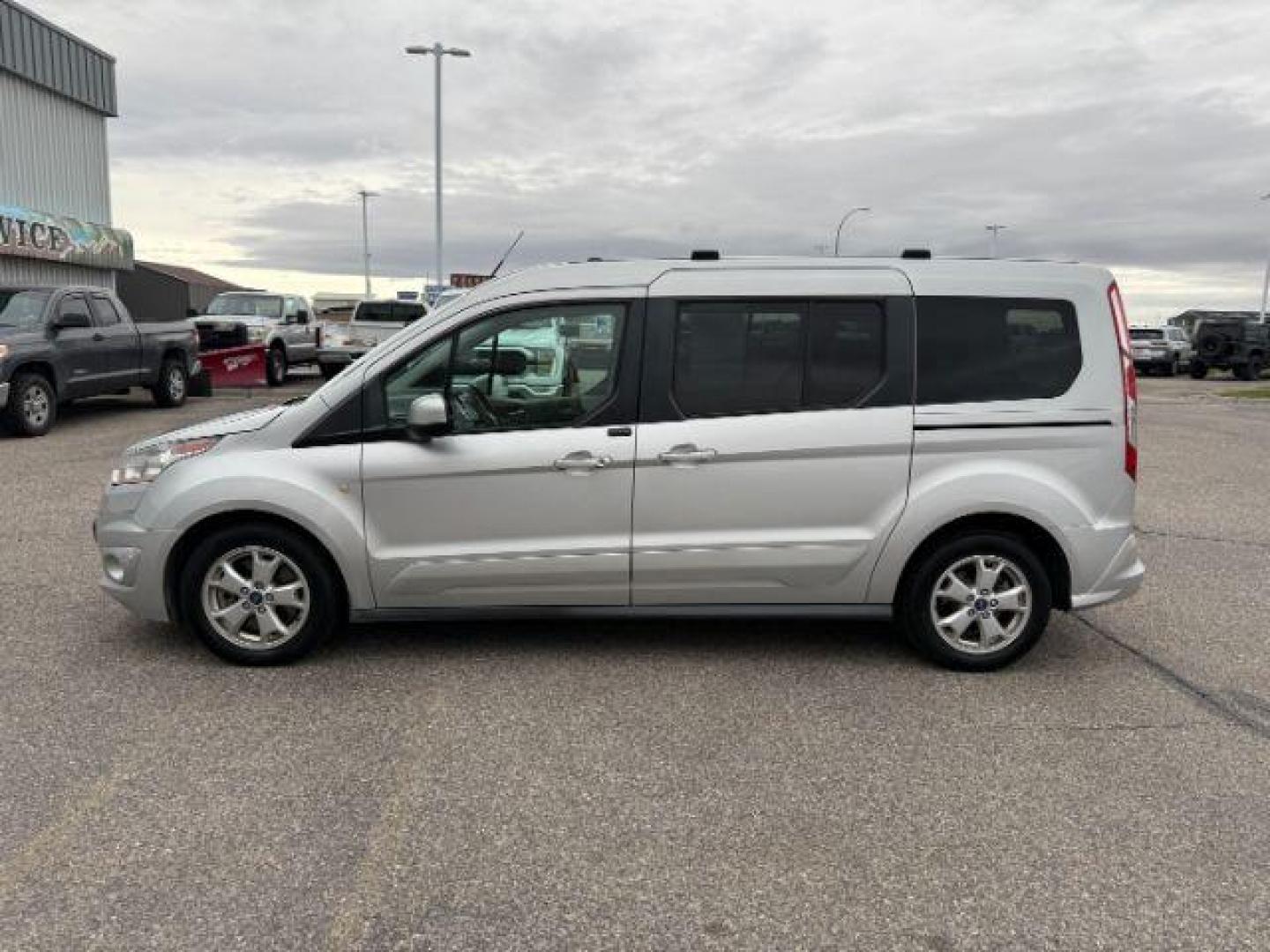2014 SILVER /CLOTH Ford Transit Connect Wagon (NM0GE9G75E1) with an 25 I4 engine, Automatic transmission, located at 1175 N Woodruff Ave, Idaho Falls, ID, 83401, 43.506901, -111.999657 - At Timberline Auto, finding a great deal on your next vehicle is always easy! Our experienced sales staff's goal is to help find you the right vehicle at the right price! Our knowledgeable finance department has options for almost any credit score. We offer extended service contract options to prote - Photo#26