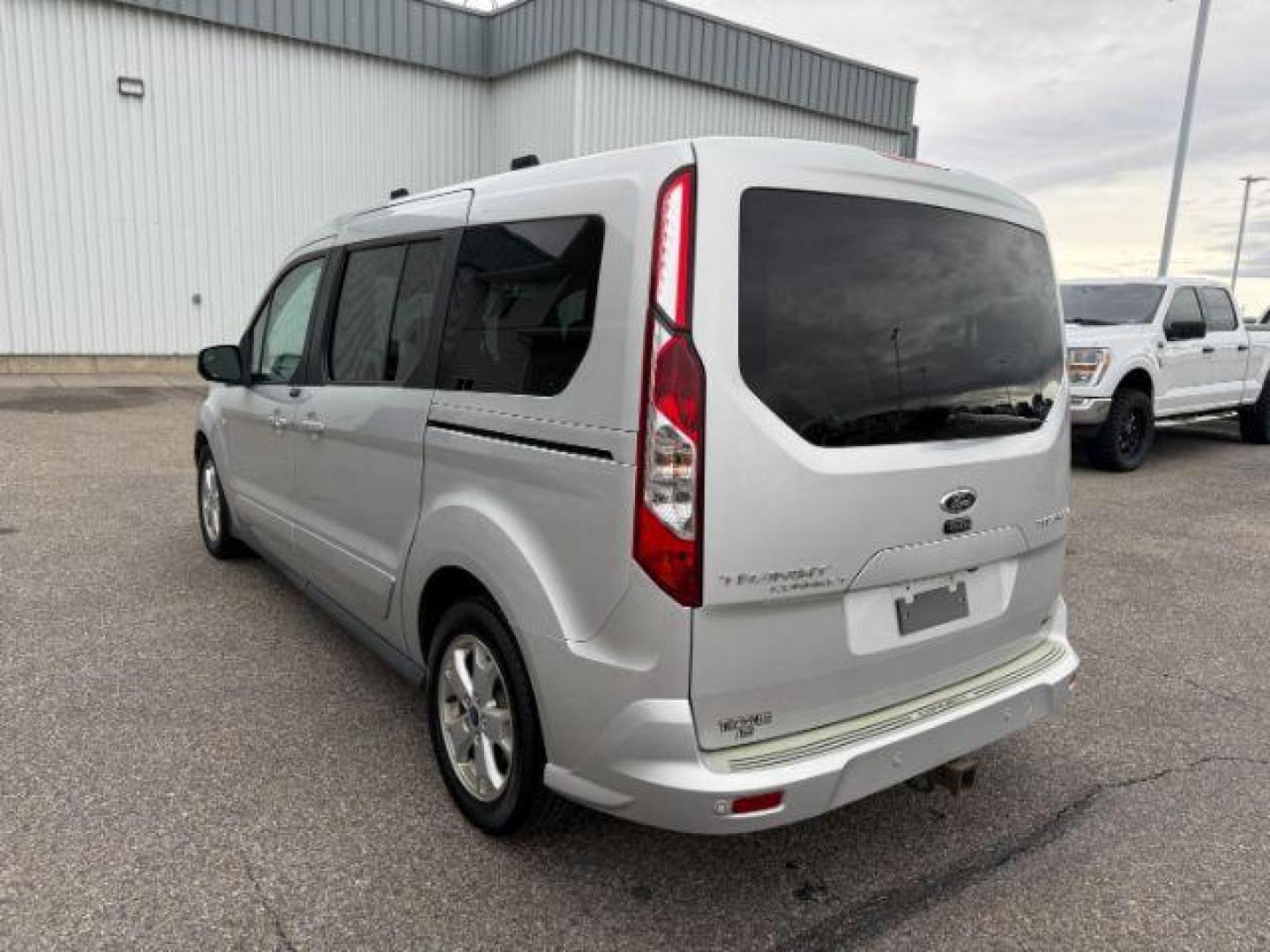 2014 SILVER /CLOTH Ford Transit Connect Wagon (NM0GE9G75E1) with an 25 I4 engine, Automatic transmission, located at 1175 N Woodruff Ave, Idaho Falls, ID, 83401, 43.506901, -111.999657 - At Timberline Auto, finding a great deal on your next vehicle is always easy! Our experienced sales staff's goal is to help find you the right vehicle at the right price! Our knowledgeable finance department has options for almost any credit score. We offer extended service contract options to prote - Photo#27