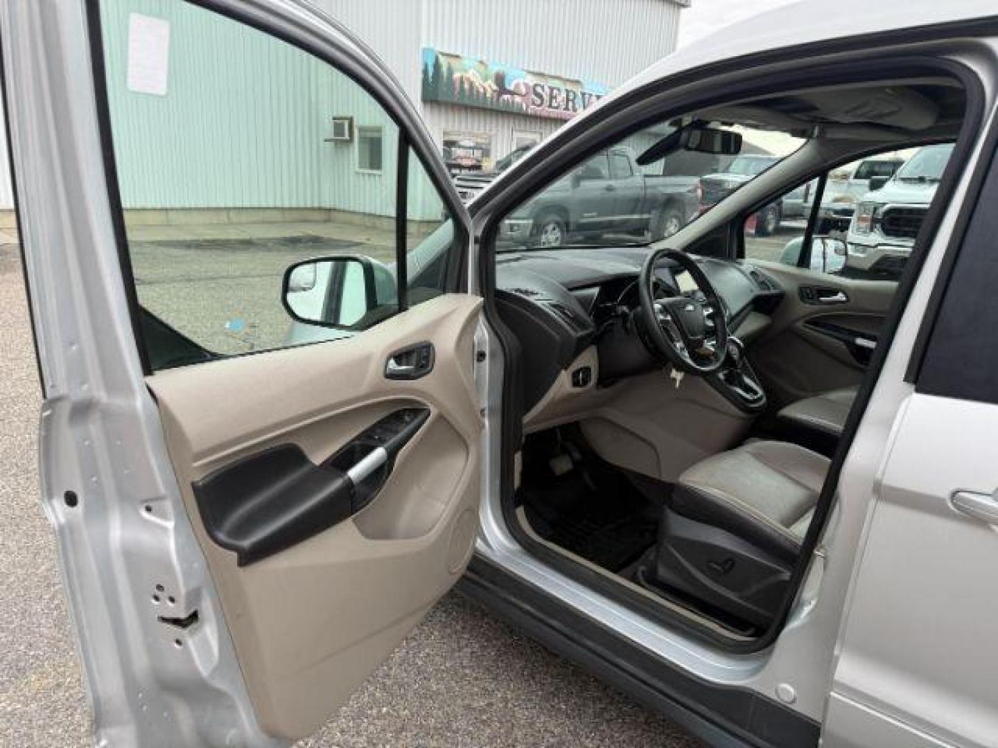 2014 SILVER /CLOTH Ford Transit Connect Wagon (NM0GE9G75E1) with an 25 I4 engine, Automatic transmission, located at 1175 N Woodruff Ave, Idaho Falls, ID, 83401, 43.506901, -111.999657 - At Timberline Auto, finding a great deal on your next vehicle is always easy! Our experienced sales staff's goal is to help find you the right vehicle at the right price! Our knowledgeable finance department has options for almost any credit score. We offer extended service contract options to prote - Photo#36