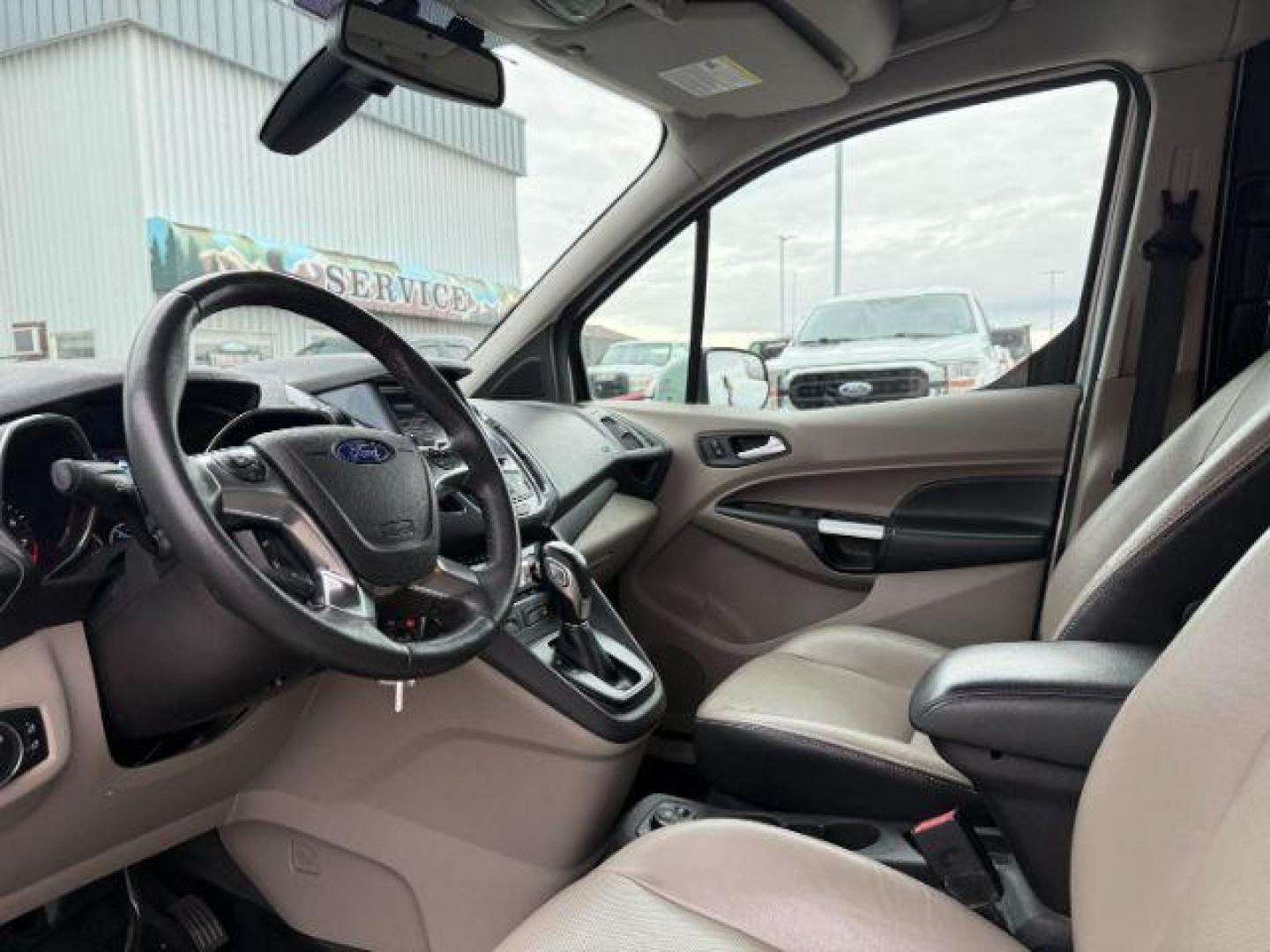 2014 SILVER /CLOTH Ford Transit Connect Wagon (NM0GE9G75E1) with an 25 I4 engine, Automatic transmission, located at 1175 N Woodruff Ave, Idaho Falls, ID, 83401, 43.506901, -111.999657 - At Timberline Auto, finding a great deal on your next vehicle is always easy! Our experienced sales staff's goal is to help find you the right vehicle at the right price! Our knowledgeable finance department has options for almost any credit score. We offer extended service contract options to prote - Photo#38