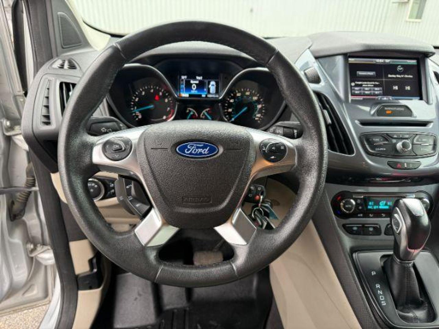 2014 SILVER /CLOTH Ford Transit Connect Wagon (NM0GE9G75E1) with an 25 I4 engine, Automatic transmission, located at 1175 N Woodruff Ave, Idaho Falls, ID, 83401, 43.506901, -111.999657 - At Timberline Auto, finding a great deal on your next vehicle is always easy! Our experienced sales staff's goal is to help find you the right vehicle at the right price! Our knowledgeable finance department has options for almost any credit score. We offer extended service contract options to prote - Photo#39