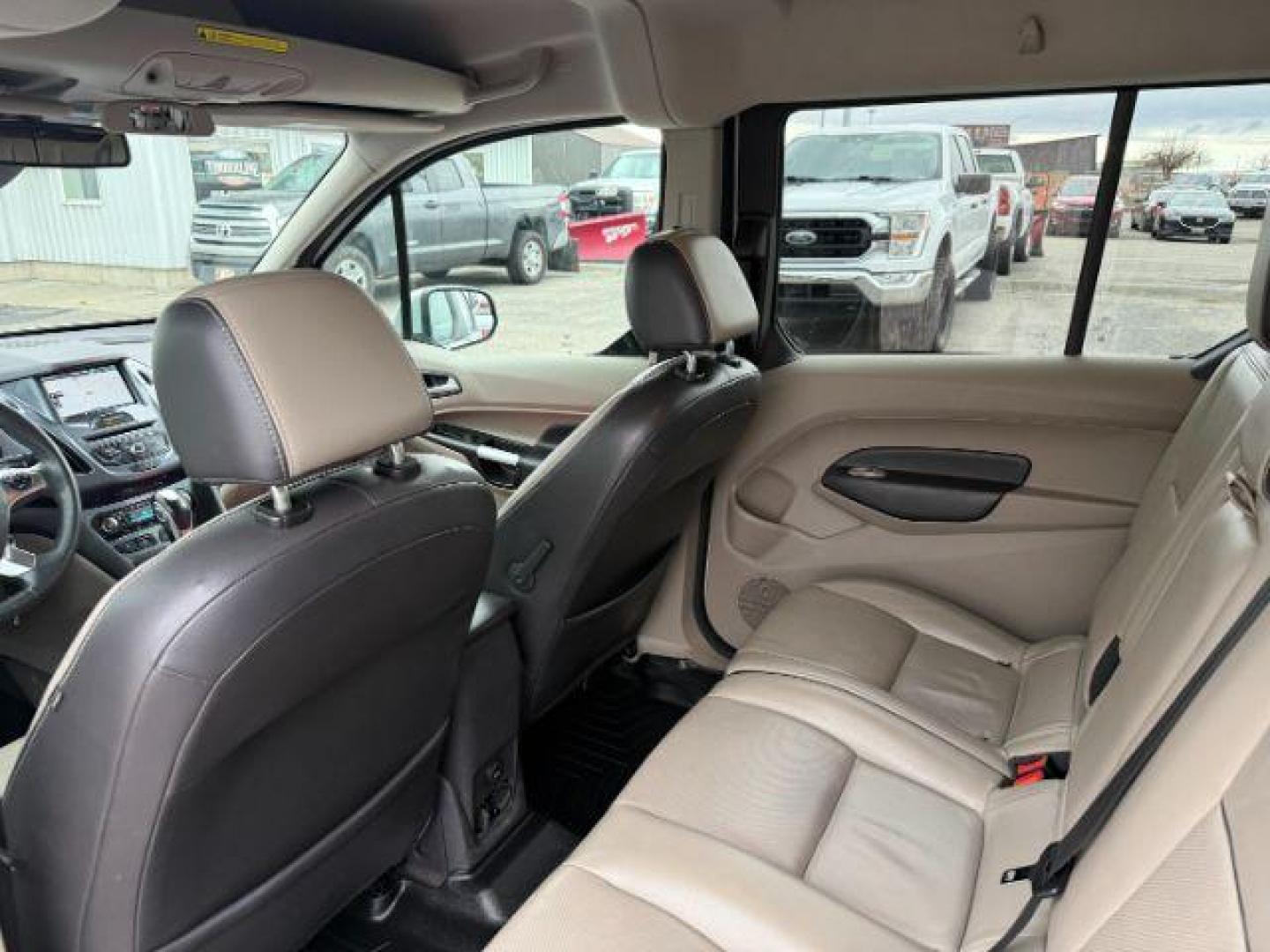 2014 SILVER /CLOTH Ford Transit Connect Wagon (NM0GE9G75E1) with an 25 I4 engine, Automatic transmission, located at 1175 N Woodruff Ave, Idaho Falls, ID, 83401, 43.506901, -111.999657 - At Timberline Auto, finding a great deal on your next vehicle is always easy! Our experienced sales staff's goal is to help find you the right vehicle at the right price! Our knowledgeable finance department has options for almost any credit score. We offer extended service contract options to prote - Photo#48