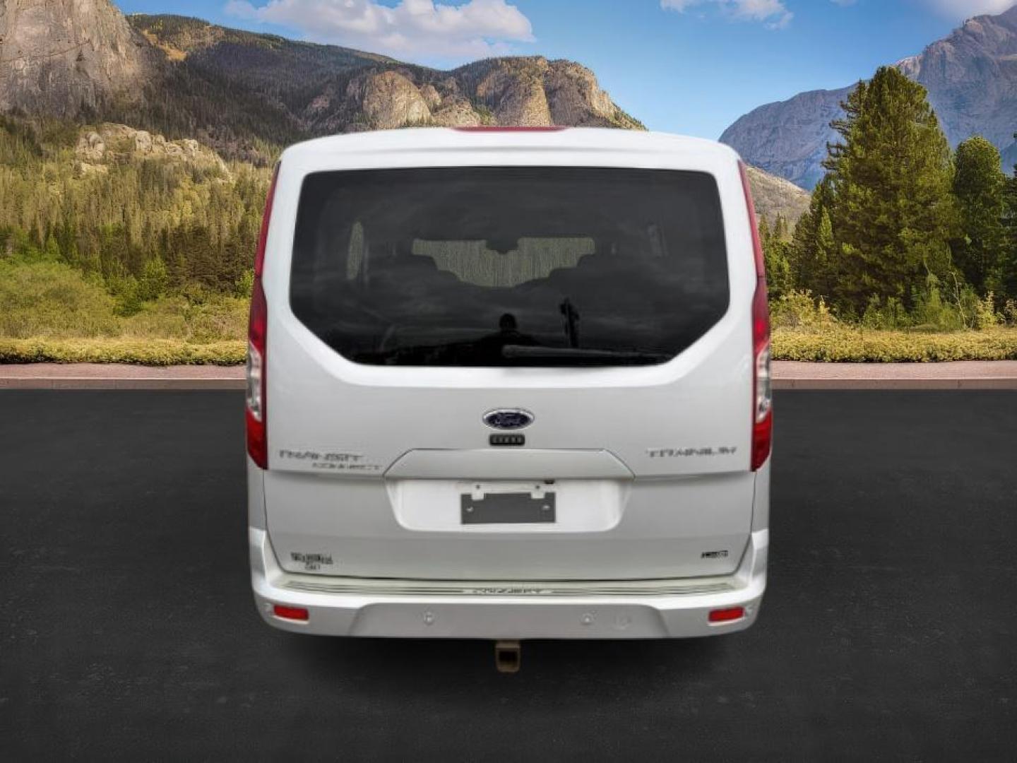 2014 SILVER /CLOTH Ford Transit Connect Wagon (NM0GE9G75E1) with an 25 I4 engine, Automatic transmission, located at 1175 N Woodruff Ave, Idaho Falls, ID, 83401, 43.506901, -111.999657 - At Timberline Auto, finding a great deal on your next vehicle is always easy! Our experienced sales staff's goal is to help find you the right vehicle at the right price! Our knowledgeable finance department has options for almost any credit score. We offer extended service contract options to prote - Photo#3