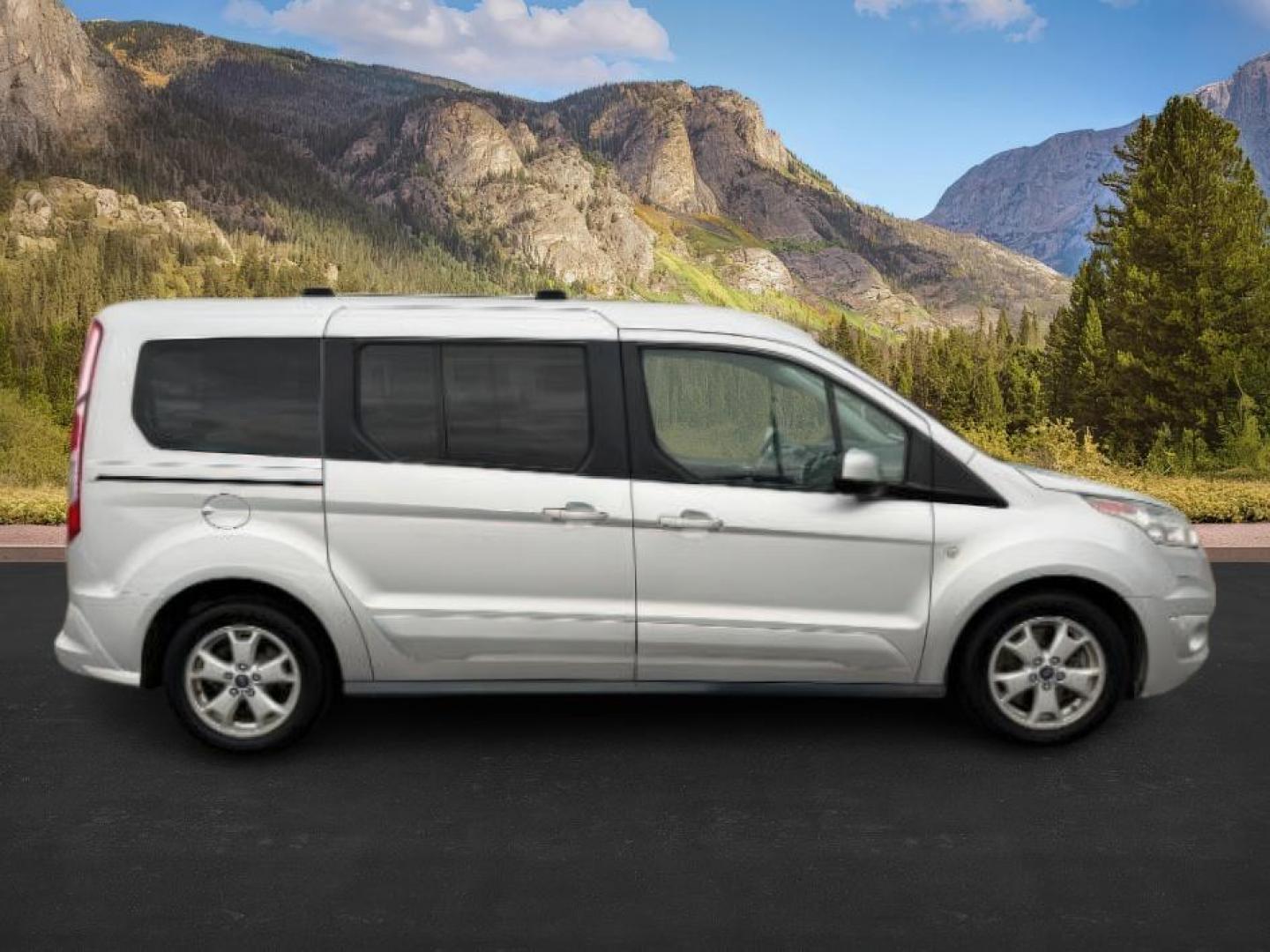 2014 SILVER /CLOTH Ford Transit Connect Wagon (NM0GE9G75E1) with an 25 I4 engine, Automatic transmission, located at 1175 N Woodruff Ave, Idaho Falls, ID, 83401, 43.506901, -111.999657 - At Timberline Auto, finding a great deal on your next vehicle is always easy! Our experienced sales staff's goal is to help find you the right vehicle at the right price! Our knowledgeable finance department has options for almost any credit score. We offer extended service contract options to prote - Photo#7