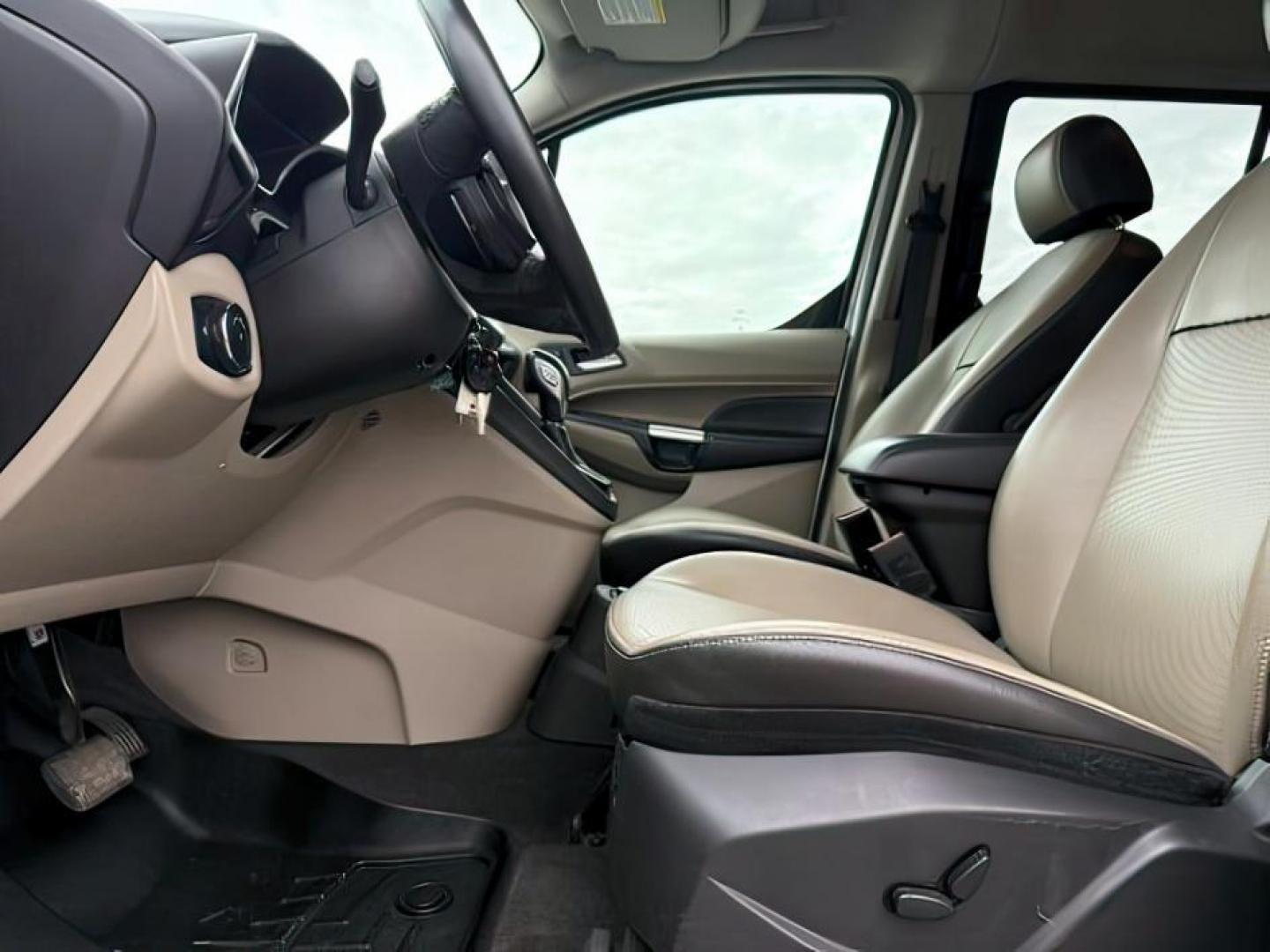 2014 SILVER /CLOTH Ford Transit Connect Wagon (NM0GE9G75E1) with an 25 I4 engine, Automatic transmission, located at 1175 N Woodruff Ave, Idaho Falls, ID, 83401, 43.506901, -111.999657 - At Timberline Auto, finding a great deal on your next vehicle is always easy! Our experienced sales staff's goal is to help find you the right vehicle at the right price! Our knowledgeable finance department has options for almost any credit score. We offer extended service contract options to prote - Photo#12