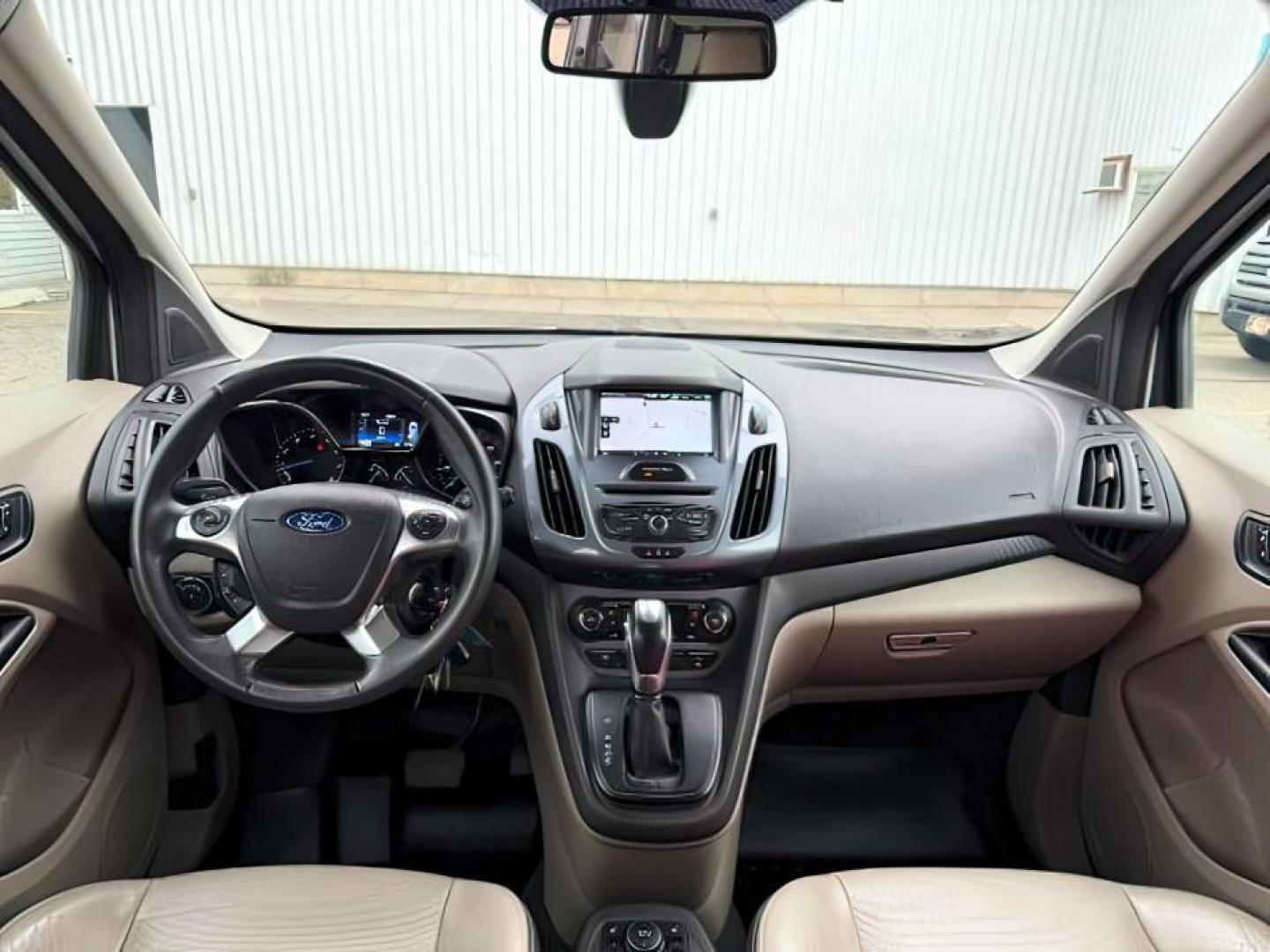 2014 SILVER /CLOTH Ford Transit Connect Wagon (NM0GE9G75E1) with an 25 I4 engine, Automatic transmission, located at 1175 N Woodruff Ave, Idaho Falls, ID, 83401, 43.506901, -111.999657 - At Timberline Auto, finding a great deal on your next vehicle is always easy! Our experienced sales staff's goal is to help find you the right vehicle at the right price! Our knowledgeable finance department has options for almost any credit score. We offer extended service contract options to prote - Photo#21