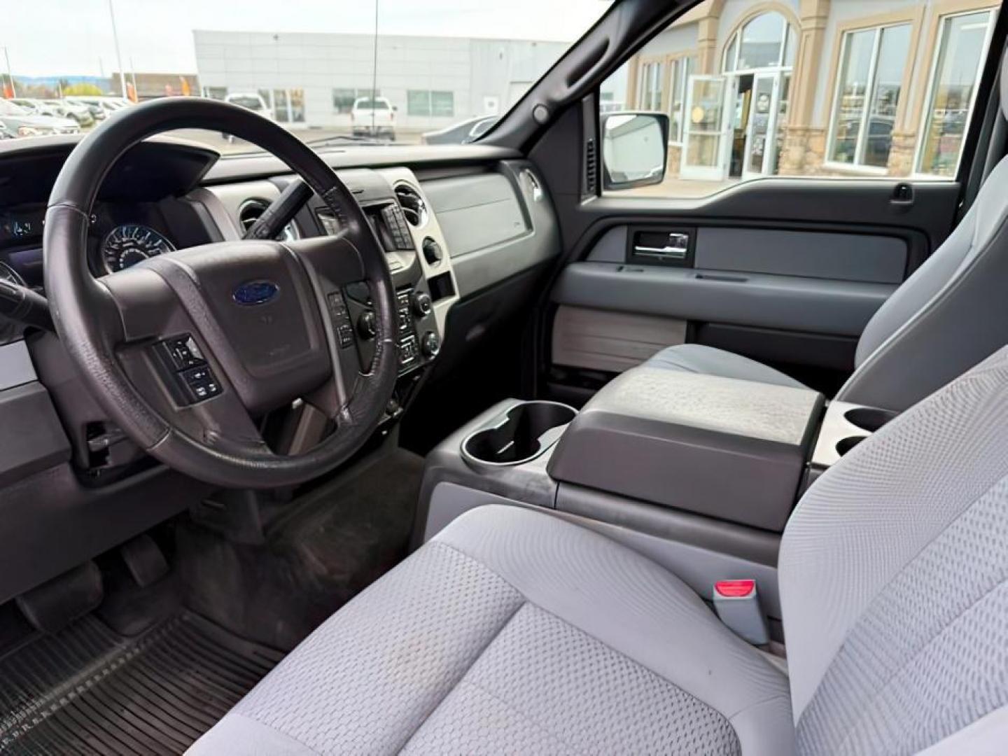 2013 Sterling Gray Metallic /Steel Gray Ford F-150 (1FTFW1ET9DF) with an EcoBoost 35L V-6 gasoline direct injection engine, Automatic transmission, located at 1175 N Woodruff Ave, Idaho Falls, ID, 83401, 43.506901, -111.999657 - At Timberline Auto, finding a great deal on your next vehicle is always easy! Our experienced sales staff's goal is to help find you the right vehicle at the right price! Our knowledgeable finance department has options for almost any credit score. We offer extended service contract options to prote - Photo#12