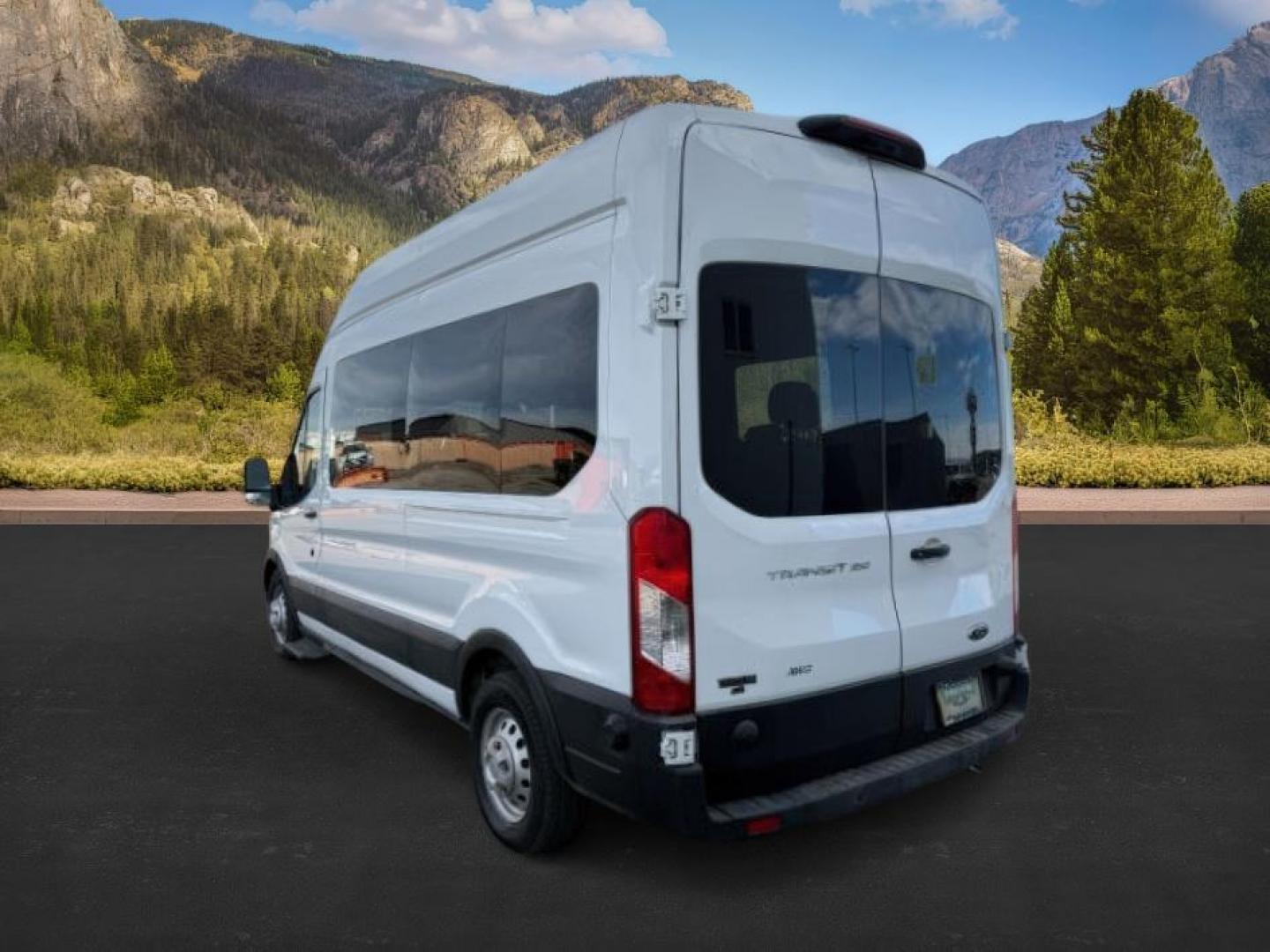 2023 Oxford White /Ebony Ford Transit Passenger Wagon (1FBAX9X80PK) with an 35L V-6 portdirect injection engine, Automatic transmission, located at 1175 N Woodruff Ave, Idaho Falls, ID, 83401, 43.506901, -111.999657 - Photo#2