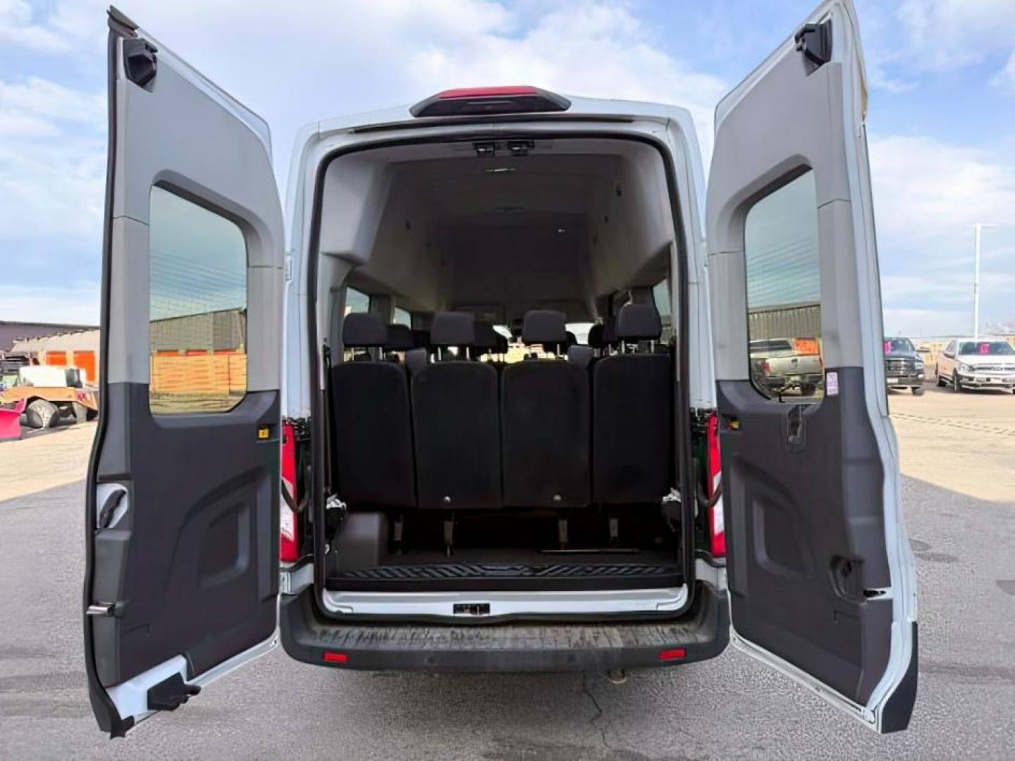 2023 Oxford White /Ebony Ford Transit Passenger Wagon (1FBAX9X80PK) with an 35L V-6 portdirect injection engine, Automatic transmission, located at 1175 N Woodruff Ave, Idaho Falls, ID, 83401, 43.506901, -111.999657 - Photo#4
