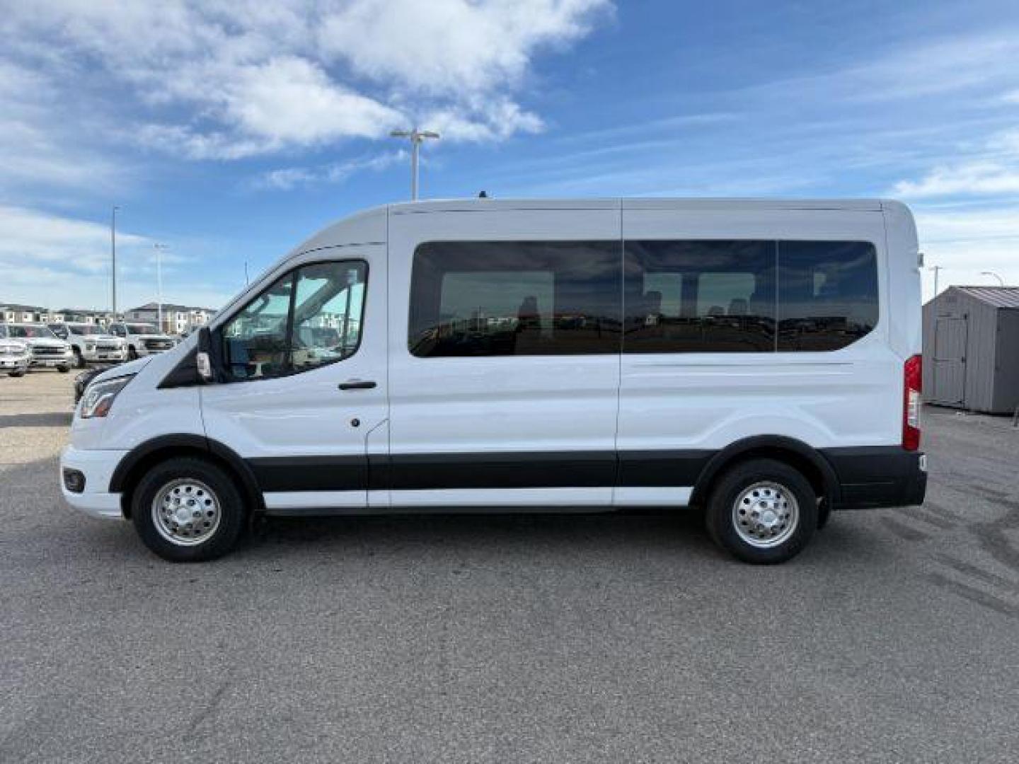 2023 Oxford White /Ebony Ford Transit-350 Passenger Van XLT (1FBAX9C82PK) with an EcoBoost 3.5L V-6 gasoline direct injection engine, AUTOMATIC transmission, located at 1235 N Woodruff Ave., Idaho Falls, 83401, (208) 523-1053, 43.507172, -112.000488 - At Timberline Auto, finding a great deal on your next vehicle is always easy! Our experienced sales staff's goal is to help find you the right vehicle at the right price! Our knowledgeable finance department has options for almost any credit score. We offer extended service contract options to prote - Photo#25