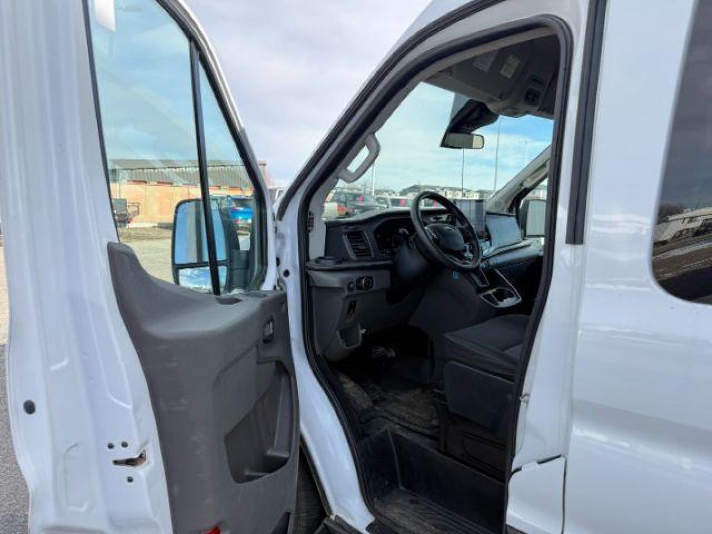 2023 Oxford White /Ebony Ford Transit-350 Passenger Van XLT (1FBAX9C82PK) with an EcoBoost 3.5L V-6 gasoline direct injection engine, AUTOMATIC transmission, located at 1235 N Woodruff Ave., Idaho Falls, 83401, (208) 523-1053, 43.507172, -112.000488 - At Timberline Auto, finding a great deal on your next vehicle is always easy! Our experienced sales staff's goal is to help find you the right vehicle at the right price! Our knowledgeable finance department has options for almost any credit score. We offer extended service contract options to prote - Photo#35
