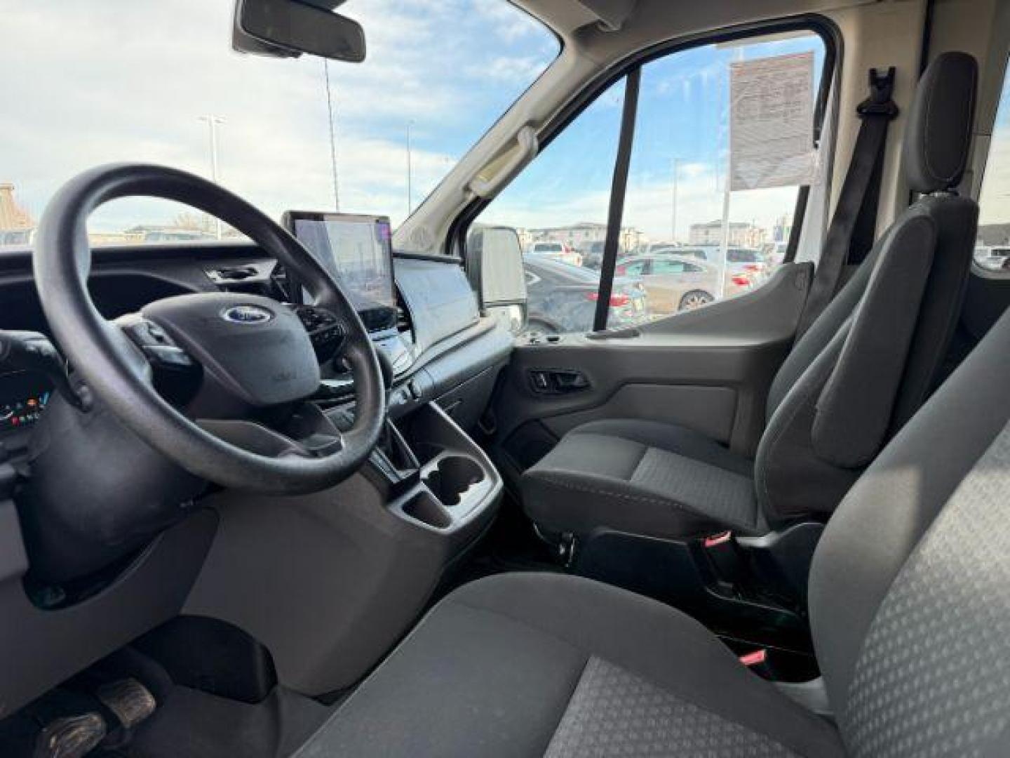 2023 Oxford White /Ebony Ford Transit-350 Passenger Van XLT (1FBAX9C82PK) with an EcoBoost 3.5L V-6 gasoline direct injection engine, AUTOMATIC transmission, located at 1235 N Woodruff Ave., Idaho Falls, 83401, (208) 523-1053, 43.507172, -112.000488 - At Timberline Auto, finding a great deal on your next vehicle is always easy! Our experienced sales staff's goal is to help find you the right vehicle at the right price! Our knowledgeable finance department has options for almost any credit score. We offer extended service contract options to prote - Photo#37