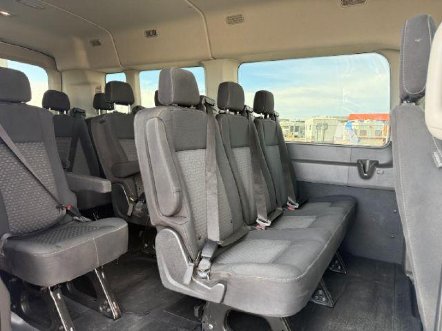 2023 Oxford White /Ebony Ford Transit-350 Passenger Van XLT (1FBAX9C82PK) with an EcoBoost 3.5L V-6 gasoline direct injection engine, AUTOMATIC transmission, located at 1235 N Woodruff Ave., Idaho Falls, 83401, (208) 523-1053, 43.507172, -112.000488 - At Timberline Auto, finding a great deal on your next vehicle is always easy! Our experienced sales staff's goal is to help find you the right vehicle at the right price! Our knowledgeable finance department has options for almost any credit score. We offer extended service contract options to prote - Photo#45