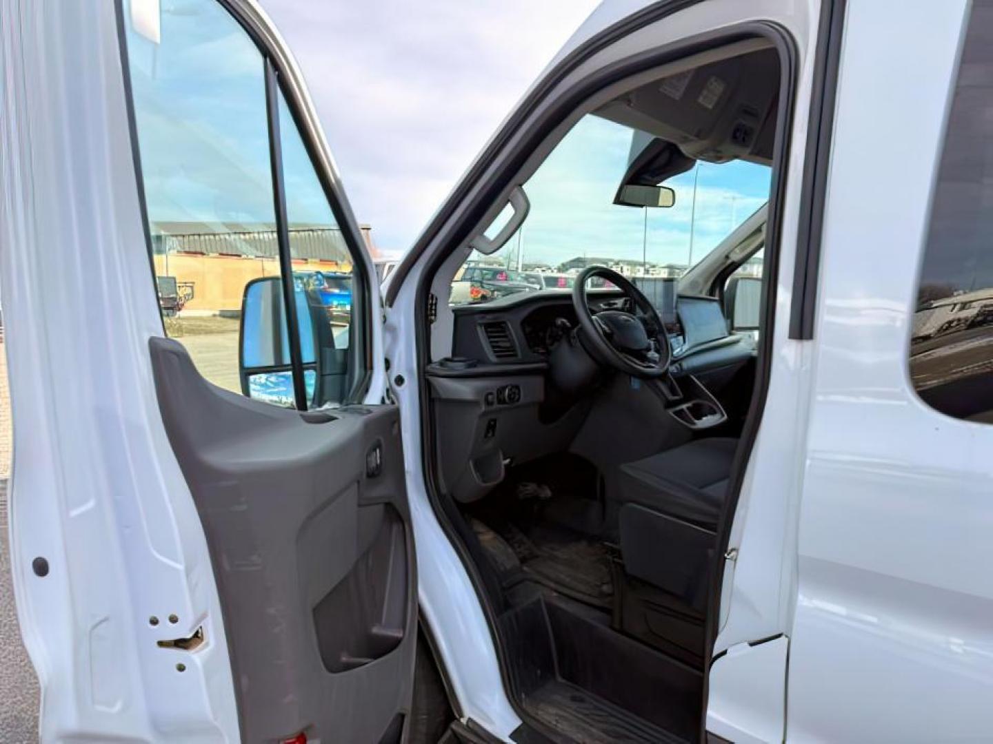 2023 Oxford White /Ebony Ford Transit-350 Passenger Van XLT (1FBAX9C82PK) with an EcoBoost 3.5L V-6 gasoline direct injection engine, AUTOMATIC transmission, located at 1235 N Woodruff Ave., Idaho Falls, 83401, (208) 523-1053, 43.507172, -112.000488 - At Timberline Auto, finding a great deal on your next vehicle is always easy! Our experienced sales staff's goal is to help find you the right vehicle at the right price! Our knowledgeable finance department has options for almost any credit score. We offer extended service contract options to prote - Photo#11