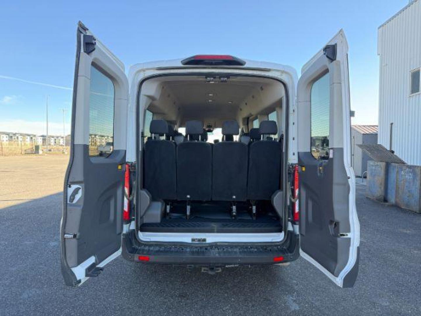 2023 Oxford White /Ebony Ford Transit-350 Passenger Van (1FBAX9C82PK) with an EcoBoost 35L V-6 gasoline direct injection engine, Automatic transmission, located at 1175 N Woodruff Ave, Idaho Falls, ID, 83401, 43.506901, -111.999657 - At Timberline Auto, finding a great deal on your next vehicle is always easy! Our experienced sales staff's goal is to help find you the right vehicle at the right price! Our knowledgeable finance department has options for almost any credit score. We offer extended service contract options to prote - Photo#28