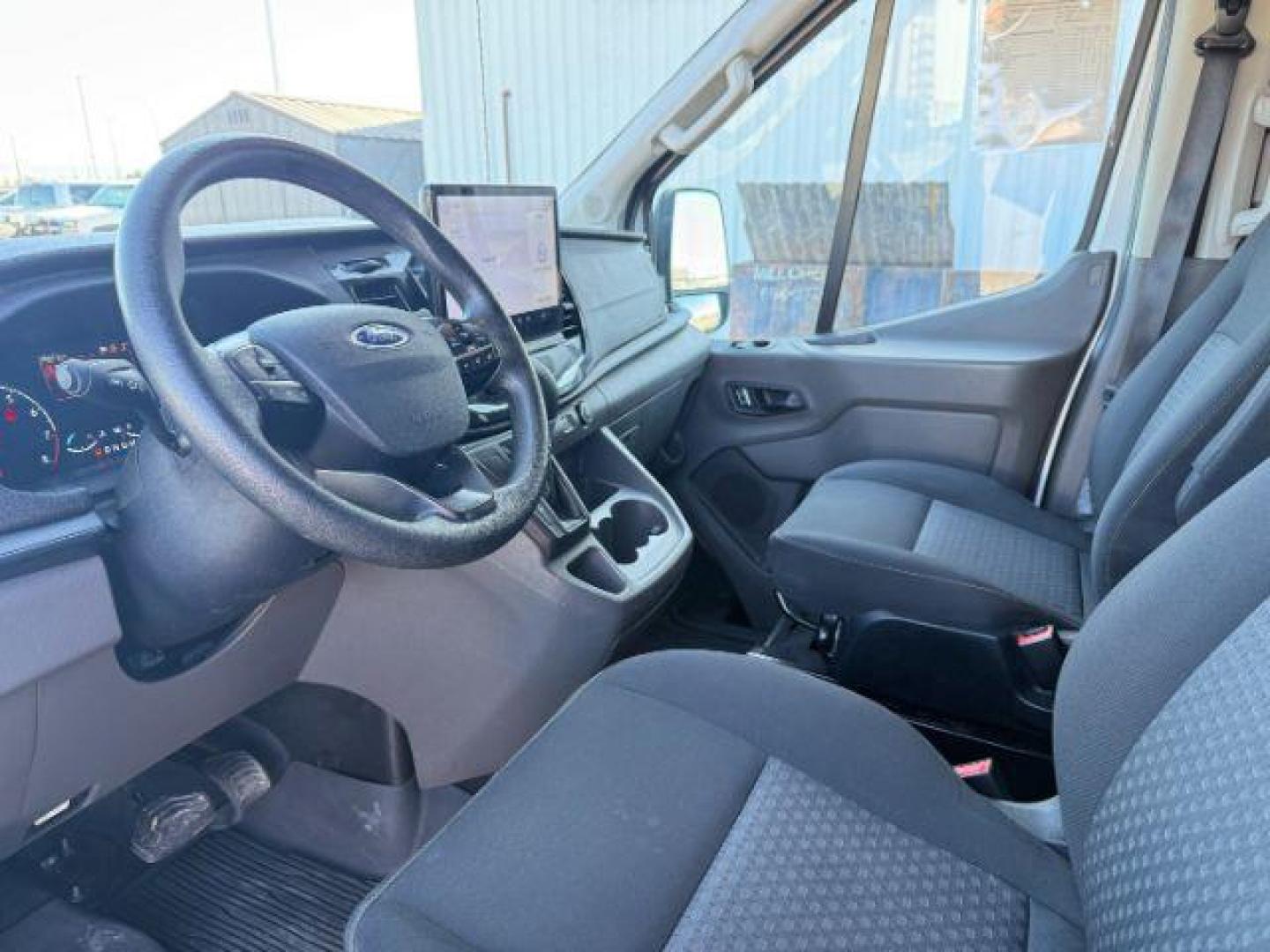 2023 Oxford White /Ebony Ford Transit-350 Passenger Van (1FBAX9C82PK) with an EcoBoost 35L V-6 gasoline direct injection engine, Automatic transmission, located at 1175 N Woodruff Ave, Idaho Falls, ID, 83401, 43.506901, -111.999657 - At Timberline Auto, finding a great deal on your next vehicle is always easy! Our experienced sales staff's goal is to help find you the right vehicle at the right price! Our knowledgeable finance department has options for almost any credit score. We offer extended service contract options to prote - Photo#37