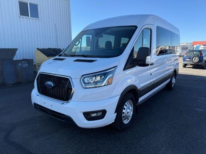 2023 Oxford White /Ebony Ford Transit Wagon XLT (1FBAX9C82PK) with an V6, 3.5L engine, 10-speed automatic transmission, located at 1175 N Woodruff Ave, Idaho Falls, ID, 83401, 43.506901, -111.999657 - <b>Vehicle Details</b><br>Looking for a versatile passenger van that delivers comfort, capability, and modern convenience? This pre-owned 2023 Ford Transit Wagon T-350 Med Roof Slide XL is a smart choice for families, businesses, and shuttle service needs alike. With 48,741 miles, AWD confidence, an- Photo#0