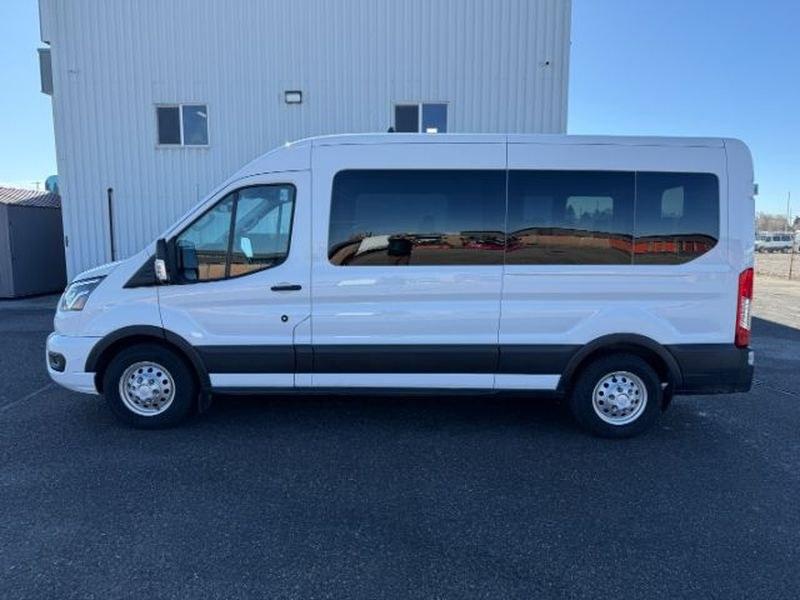 2023 Oxford White /Ebony Ford Transit Wagon XLT (1FBAX9C82PK) with an V6, 3.5L engine, 10-speed automatic transmission, located at 1175 N Woodruff Ave, Idaho Falls, ID, 83401, 43.506901, -111.999657 - <b>Vehicle Details</b><br>Looking for a versatile passenger van that delivers comfort, capability, and modern convenience? This pre-owned 2023 Ford Transit Wagon T-350 Med Roof Slide XL is a smart choice for families, businesses, and shuttle service needs alike. With 48,741 miles, AWD confidence, an- Photo#1