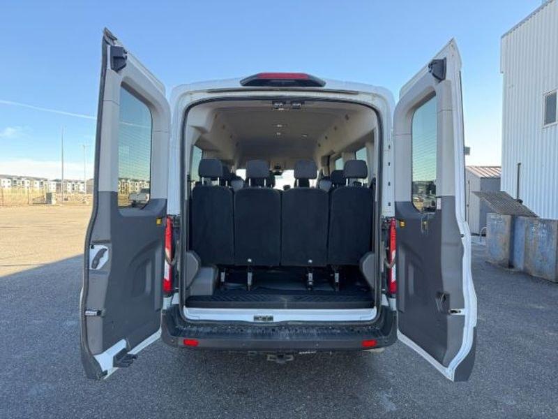 2023 Oxford White /Ebony Ford Transit Wagon XLT (1FBAX9C82PK) with an V6, 3.5L engine, 10-speed automatic transmission, located at 1175 N Woodruff Ave, Idaho Falls, ID, 83401, 43.506901, -111.999657 - <b>Vehicle Details</b><br>Looking for a versatile passenger van that delivers comfort, capability, and modern convenience? This pre-owned 2023 Ford Transit Wagon T-350 Med Roof Slide XL is a smart choice for families, businesses, and shuttle service needs alike. With 48,741 miles, AWD confidence, an- Photo#4