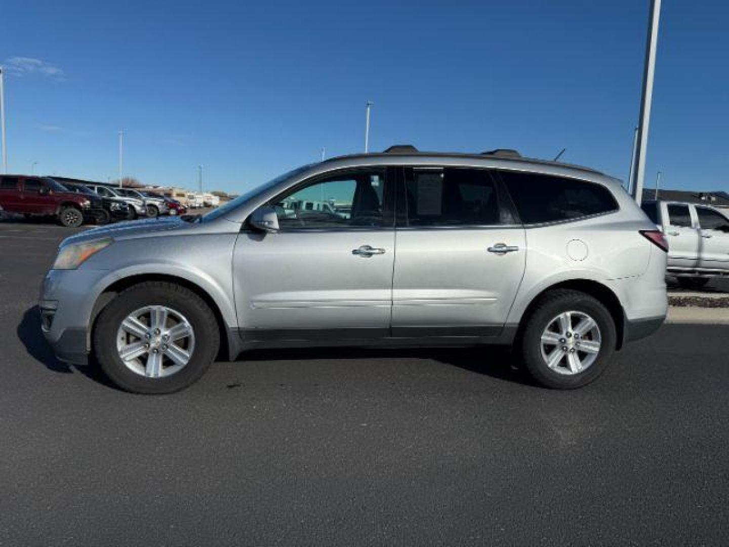 2014 Silver Ice Metallic /Ebony Chevrolet Traverse (1GNKVHKD9EJ) with an 36L V-6 gasoline direct injection engine, Automatic transmission, located at 1175 N Woodruff Ave, Idaho Falls, ID, 83401, 43.506901, -111.999657 - At Timberline Auto, finding a great deal on your next vehicle is always easy! Our experienced sales staff's goal is to help find you the right vehicle at the right price! Our knowledgeable finance department has options for almost any credit score. We offer extended service contract options to prote - Photo#1