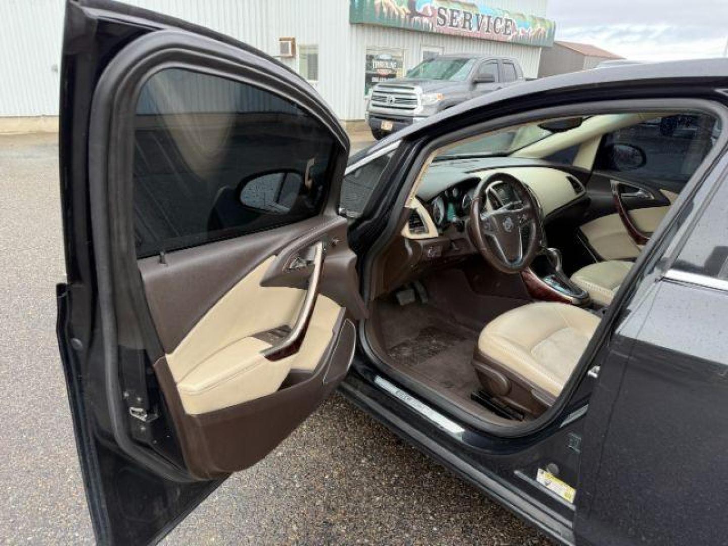2013 BLACK /BEIGE Buick Verano (1G4PP5SKXD4) with an 24L I4 engine, Automatic transmission, located at 1175 N Woodruff Ave, Idaho Falls, ID, 83401, 43.506901, -111.999657 - At Timberline Auto, finding a great deal on your next vehicle is always easy! Our experienced sales staff's goal is to help find you the right vehicle at the right price! Our knowledgeable finance department has options for almost any credit score. We offer extended service contract options to prote - Photo#29