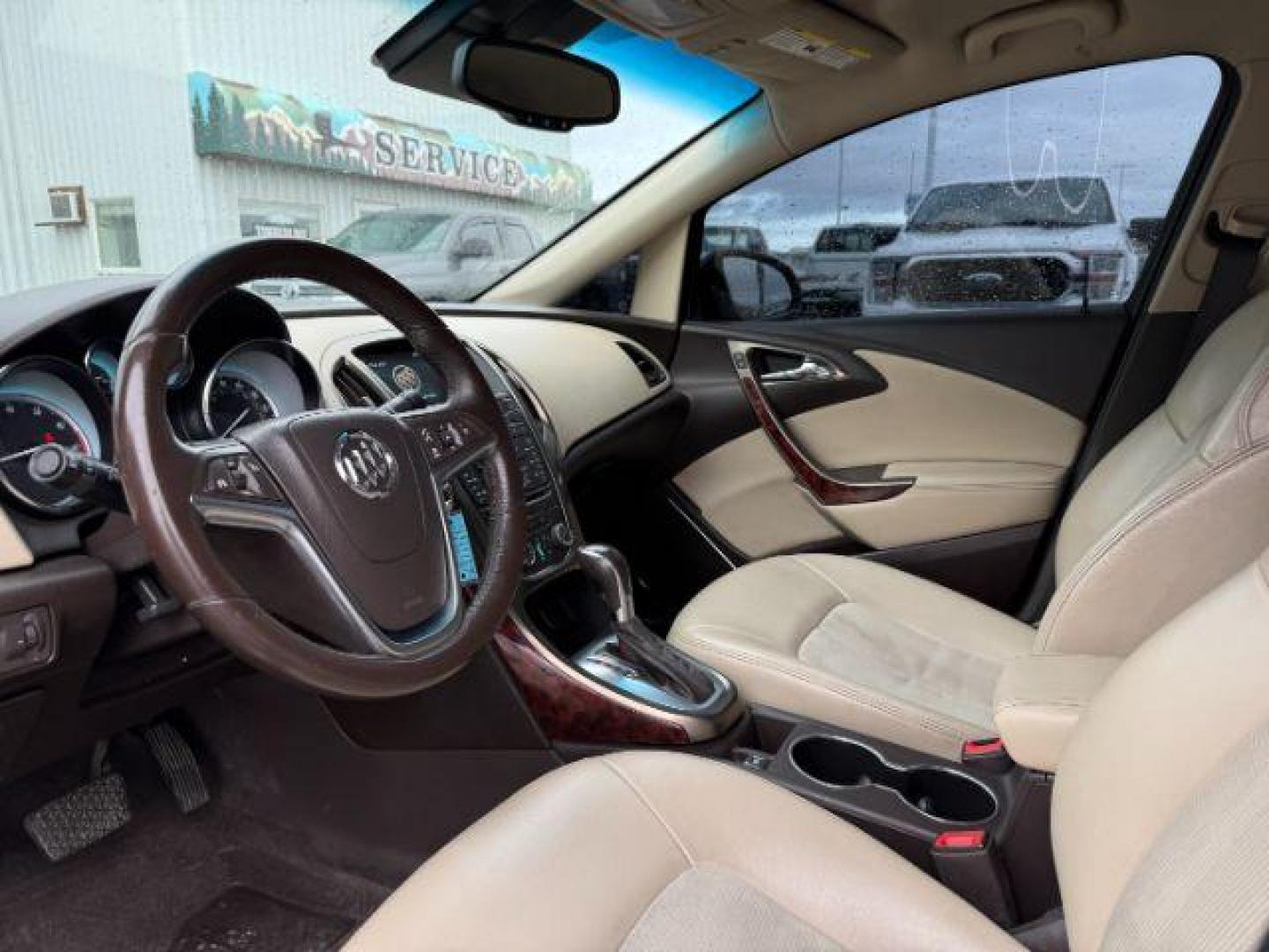 2013 BLACK /BEIGE Buick Verano (1G4PP5SKXD4) with an 24L I4 engine, Automatic transmission, located at 1175 N Woodruff Ave, Idaho Falls, ID, 83401, 43.506901, -111.999657 - At Timberline Auto, finding a great deal on your next vehicle is always easy! Our experienced sales staff's goal is to help find you the right vehicle at the right price! Our knowledgeable finance department has options for almost any credit score. We offer extended service contract options to prote - Photo#31
