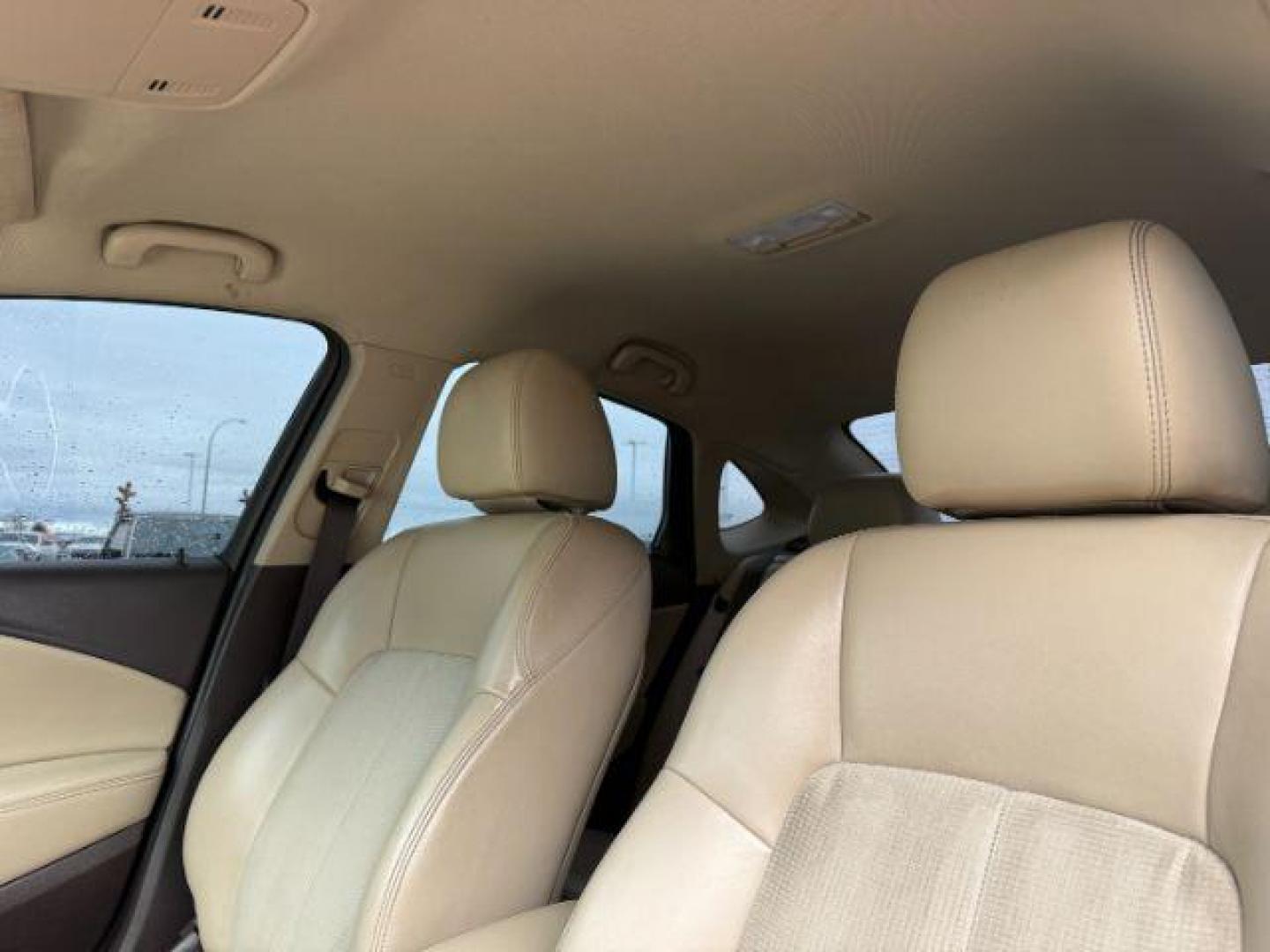 2013 BLACK /BEIGE Buick Verano (1G4PP5SKXD4) with an 24L I4 engine, Automatic transmission, located at 1175 N Woodruff Ave, Idaho Falls, ID, 83401, 43.506901, -111.999657 - At Timberline Auto, finding a great deal on your next vehicle is always easy! Our experienced sales staff's goal is to help find you the right vehicle at the right price! Our knowledgeable finance department has options for almost any credit score. We offer extended service contract options to prote - Photo#35