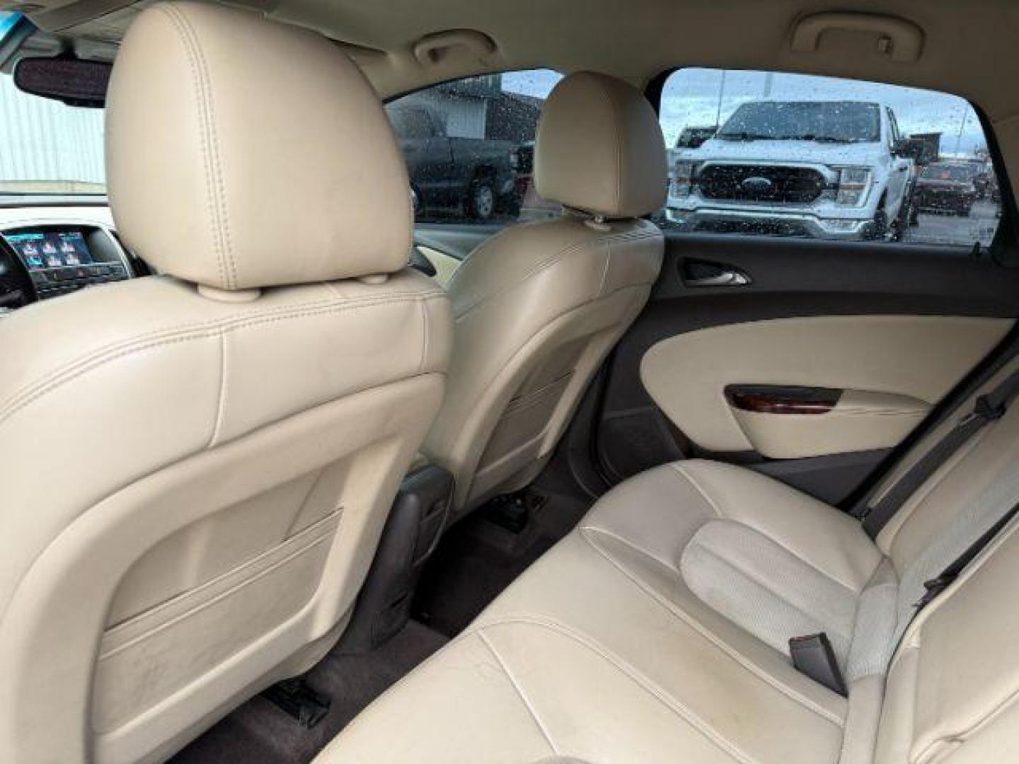 2013 BLACK /BEIGE Buick Verano (1G4PP5SKXD4) with an 24L I4 engine, Automatic transmission, located at 1175 N Woodruff Ave, Idaho Falls, ID, 83401, 43.506901, -111.999657 - At Timberline Auto, finding a great deal on your next vehicle is always easy! Our experienced sales staff's goal is to help find you the right vehicle at the right price! Our knowledgeable finance department has options for almost any credit score. We offer extended service contract options to prote - Photo#38