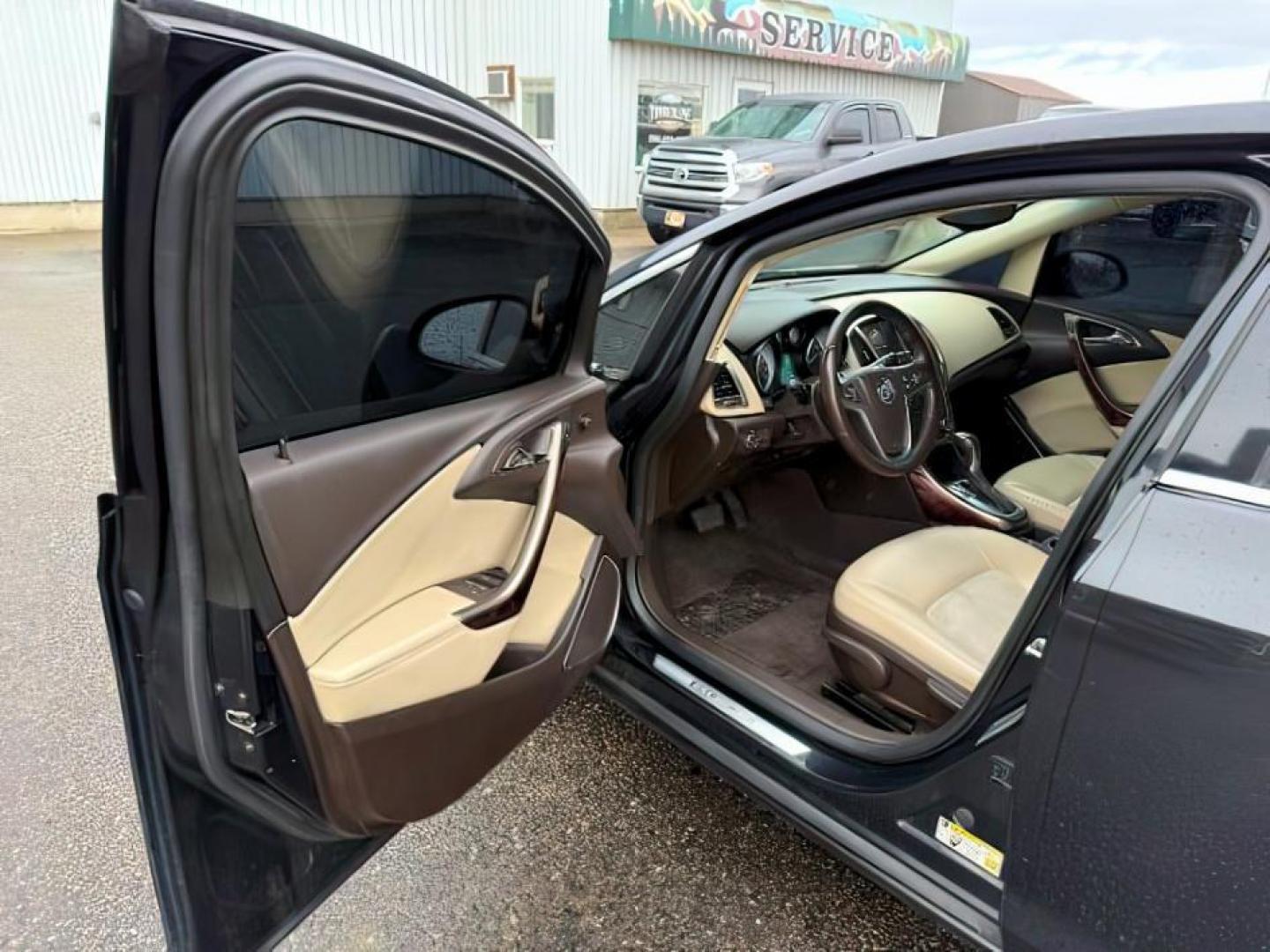 2013 BLACK /BEIGE Buick Verano (1G4PP5SKXD4) with an 24L I4 engine, Automatic transmission, located at 1175 N Woodruff Ave, Idaho Falls, ID, 83401, 43.506901, -111.999657 - At Timberline Auto, finding a great deal on your next vehicle is always easy! Our experienced sales staff's goal is to help find you the right vehicle at the right price! Our knowledgeable finance department has options for almost any credit score. We offer extended service contract options to prote - Photo#9