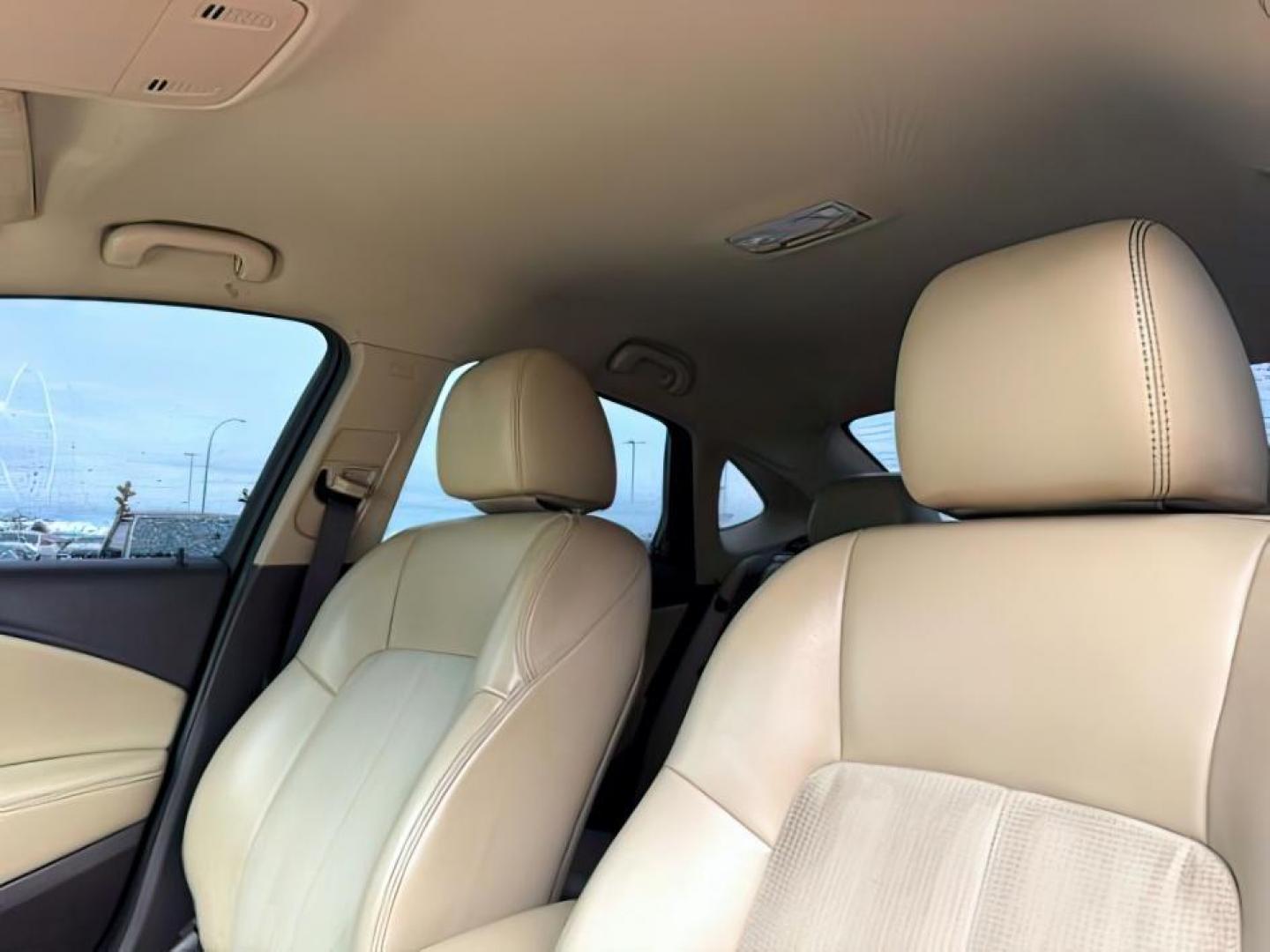 2013 BLACK /BEIGE Buick Verano (1G4PP5SKXD4) with an 24L I4 engine, Automatic transmission, located at 1175 N Woodruff Ave, Idaho Falls, ID, 83401, 43.506901, -111.999657 - At Timberline Auto, finding a great deal on your next vehicle is always easy! Our experienced sales staff's goal is to help find you the right vehicle at the right price! Our knowledgeable finance department has options for almost any credit score. We offer extended service contract options to prote - Photo#15