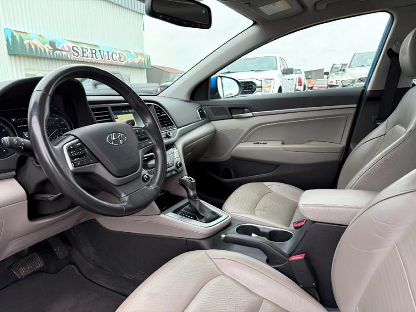 2017 Electric Blue /Black Hyundai Elantra (5NPD84LF4HH) with an Nu 2L I-4 DOHC engine, Automatic transmission, located at 1175 N Woodruff Ave, Idaho Falls, ID, 83401, 43.506901, -111.999657 - At Timberline Auto, finding a great deal on your next vehicle is always easy! Our experienced sales staff's goal is to help find you the right vehicle at the right price! Our knowledgeable finance department has options for almost any credit score. We offer extended service contract options to prote - Photo#12