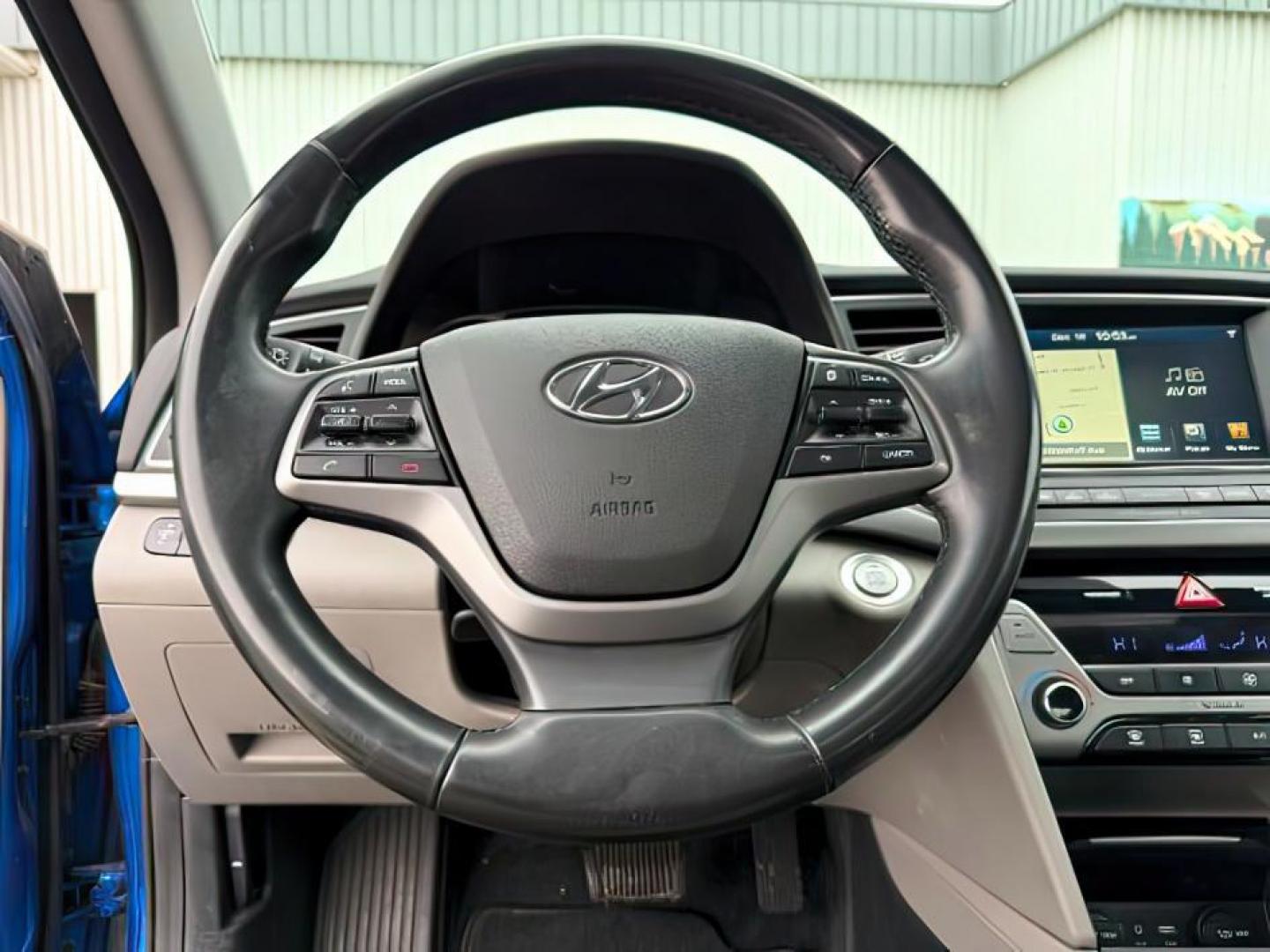 2017 Electric Blue /Black Hyundai Elantra (5NPD84LF4HH) with an Nu 2L I-4 DOHC engine, Automatic transmission, located at 1175 N Woodruff Ave, Idaho Falls, ID, 83401, 43.506901, -111.999657 - At Timberline Auto, finding a great deal on your next vehicle is always easy! Our experienced sales staff's goal is to help find you the right vehicle at the right price! Our knowledgeable finance department has options for almost any credit score. We offer extended service contract options to prote - Photo#13