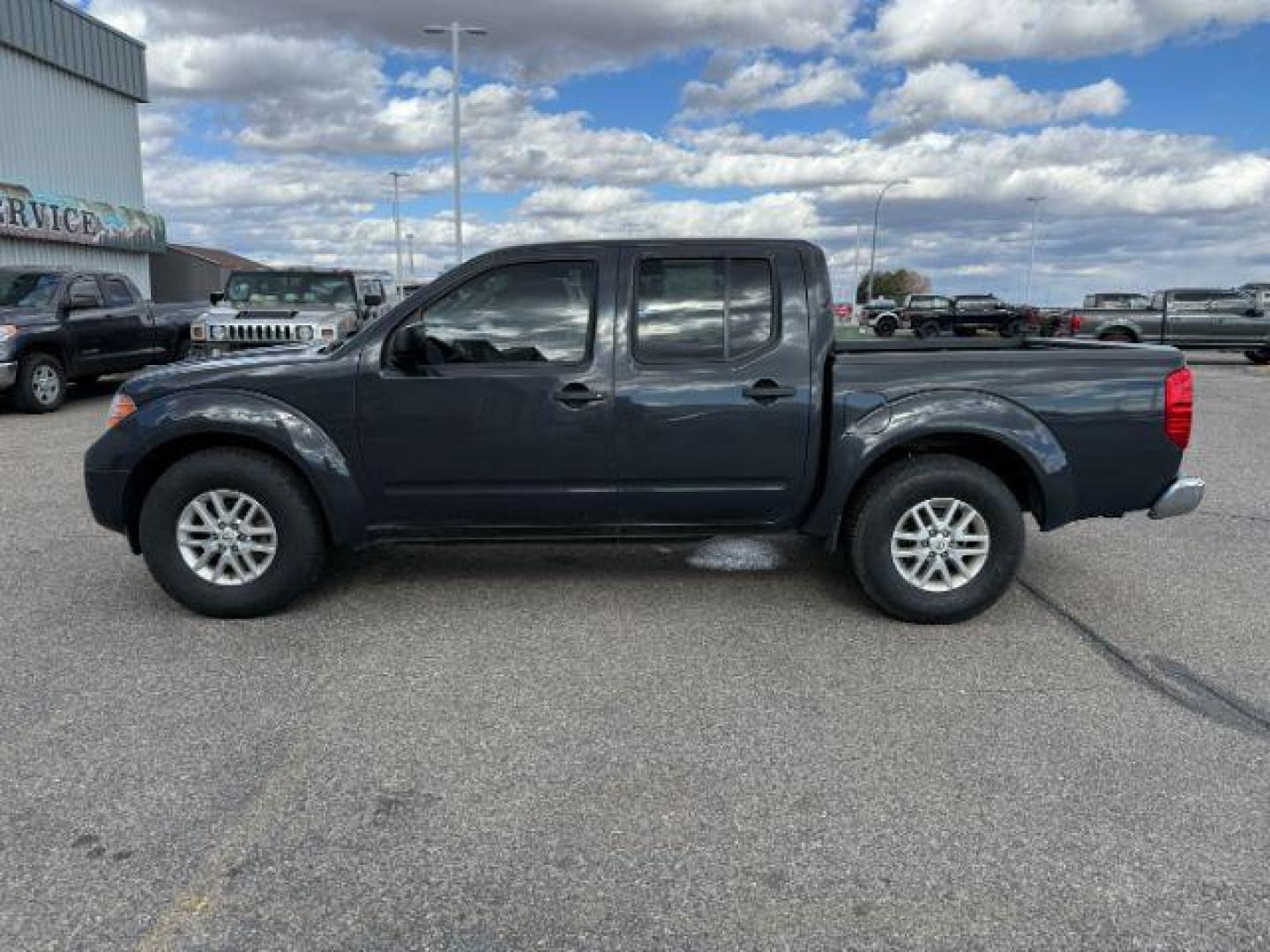 2014 GRAY /Steel Nissan Frontier (1N6AD0ER1EN) with an VQ 4L V-6 DOHC engine, Automatic transmission, located at 1175 N Woodruff Ave, Idaho Falls, ID, 83401, 43.506901, -111.999657 - At Timberline Auto, finding a great deal on your next vehicle is always easy! Our experienced sales staff's goal is to help find you the right vehicle at the right price! Our knowledgeable finance department has options for almost any credit score. We offer extended service contract options to prote - Photo#21