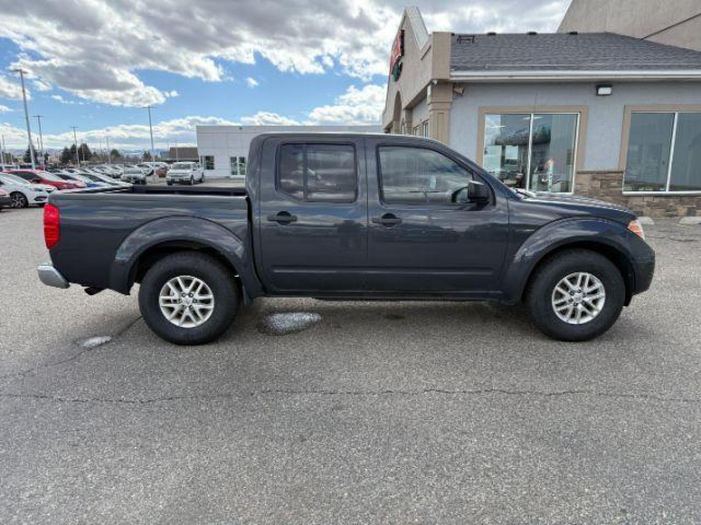 2014 GRAY /Steel Nissan Frontier (1N6AD0ER1EN) with an VQ 4L V-6 DOHC engine, Automatic transmission, located at 1175 N Woodruff Ave, Idaho Falls, ID, 83401, 43.506901, -111.999657 - At Timberline Auto, finding a great deal on your next vehicle is always easy! Our experienced sales staff's goal is to help find you the right vehicle at the right price! Our knowledgeable finance department has options for almost any credit score. We offer extended service contract options to prote - Photo#25