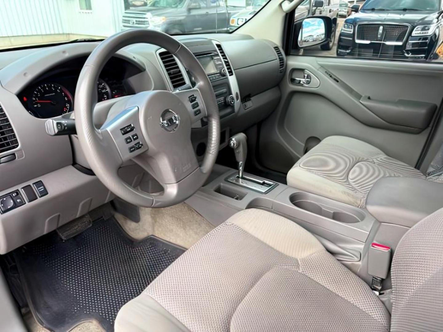 2014 GRAY /Steel Nissan Frontier (1N6AD0ER1EN) with an VQ 4L V-6 DOHC engine, Automatic transmission, located at 1175 N Woodruff Ave, Idaho Falls, ID, 83401, 43.506901, -111.999657 - At Timberline Auto, finding a great deal on your next vehicle is always easy! Our experienced sales staff's goal is to help find you the right vehicle at the right price! Our knowledgeable finance department has options for almost any credit score. We offer extended service contract options to prote - Photo#11