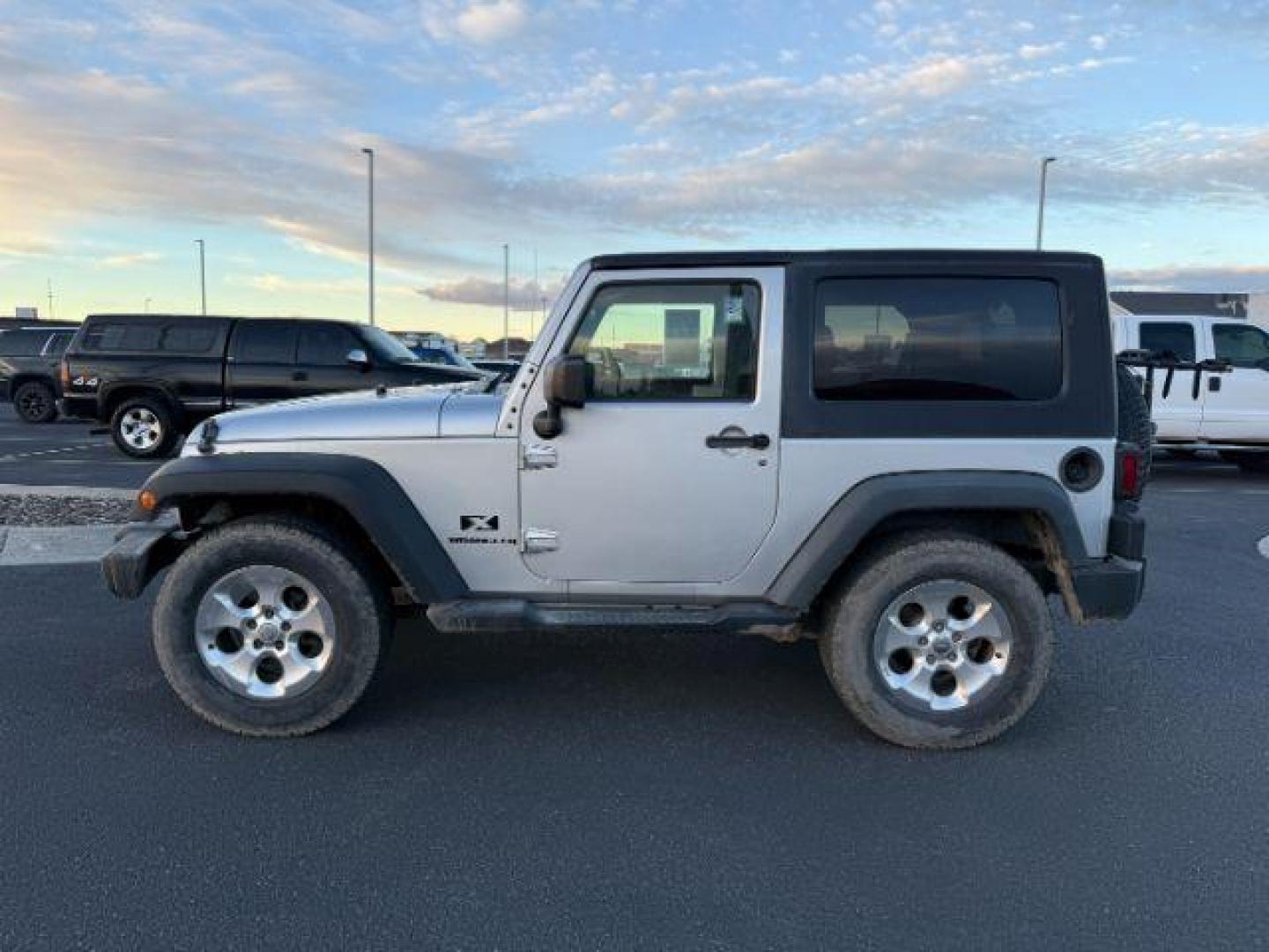 2009 SILVER /Dark Slate Gray/Med Slate Gray Jeep Wrangler (1J4FA24149L) with an 38L V-6 regular unleaded engine, Automatic transmission, located at 1175 N Woodruff Ave, Idaho Falls, ID, 83401, 43.506901, -111.999657 - At Timberline Auto, finding a great deal on your next vehicle is always easy! Our experienced sales staff's goal is to help find you the right vehicle at the right price! Our knowledgeable finance department has options for almost any credit score. We offer extended service contract options to prote - Photo#1