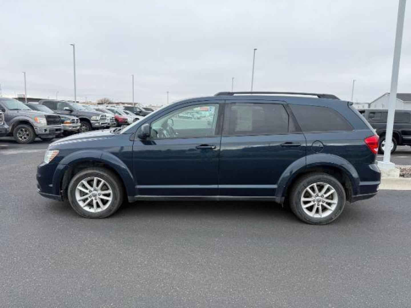 2014 BLUE /Black Dodge Journey (3C4PDDBG1ET) with an 36L V-6 DOHC engine, Automatic transmission, located at 1175 N Woodruff Ave, Idaho Falls, ID, 83401, 43.506901, -111.999657 - At Timberline Auto, finding a great deal on your next vehicle is always easy! Our experienced sales staff's goal is to help find you the right vehicle at the right price! Our knowledgeable finance department has options for almost any credit score. We offer extended service contract options to prote - Photo#1