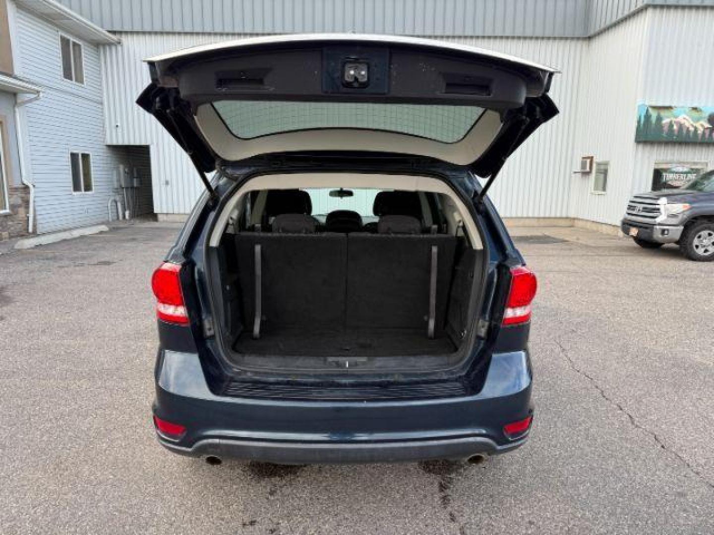 2014 BLUE /Black Dodge Journey (3C4PDDBG1ET) with an 36L V-6 DOHC engine, Automatic transmission, located at 1175 N Woodruff Ave, Idaho Falls, ID, 83401, 43.506901, -111.999657 - At Timberline Auto, finding a great deal on your next vehicle is always easy! Our experienced sales staff's goal is to help find you the right vehicle at the right price! Our knowledgeable finance department has options for almost any credit score. We offer extended service contract options to prote - Photo#25