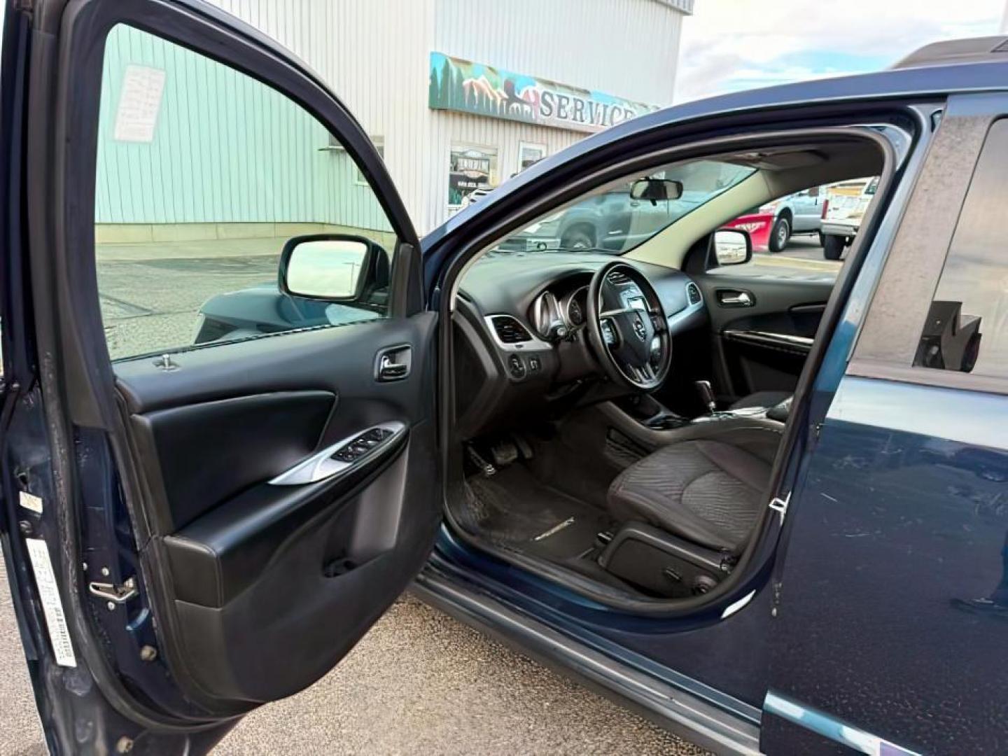 2014 BLUE /Black Dodge Journey (3C4PDDBG1ET) with an 36L V-6 DOHC engine, Automatic transmission, located at 1175 N Woodruff Ave, Idaho Falls, ID, 83401, 43.506901, -111.999657 - At Timberline Auto, finding a great deal on your next vehicle is always easy! Our experienced sales staff's goal is to help find you the right vehicle at the right price! Our knowledgeable finance department has options for almost any credit score. We offer extended service contract options to prote - Photo#11