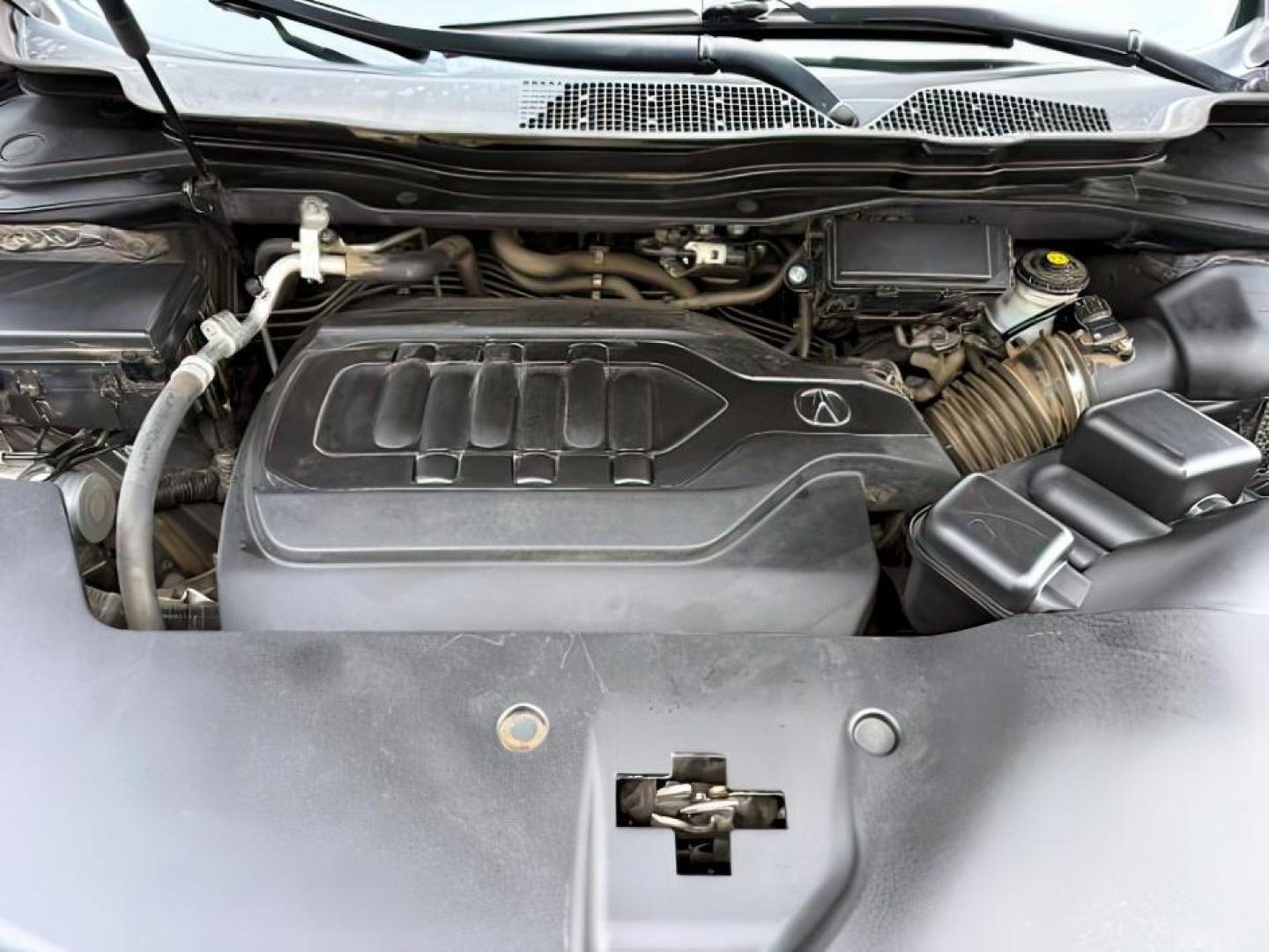 2018 GRAY /LEATHER Acura MDX (5J8YD3H33JL) with an 35L V6 engine, Automatic transmission, located at 1175 N Woodruff Ave, Idaho Falls, ID, 83401, 43.506901, -111.999657 - At Timberline Auto, finding a great deal on your next vehicle is always easy! Our experienced sales staff's goal is to help find you the right vehicle at the right price! Our knowledgeable finance department has options for almost any credit score. We offer extended service contract options to prote - Photo#26