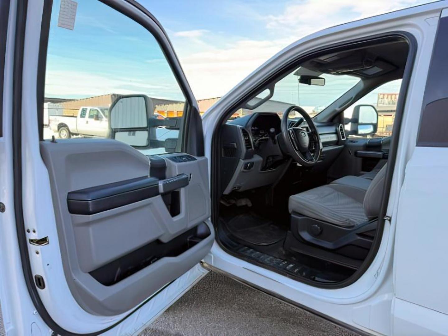 2019 Oxford White /Medium Earth Gray Ford F-250 (1FT7W2B68KE) with an 62L V-8 variable valve control engine, Automatic transmission, located at 1175 N Woodruff Ave, Idaho Falls, ID, 83401, 43.506901, -111.999657 - At Timberline Auto, finding a great deal on your next vehicle is always easy! Our experienced sales staff's goal is to help find you the right vehicle at the right price! Our knowledgeable finance department has options for almost any credit score. We offer extended service contract options to prote - Photo#11