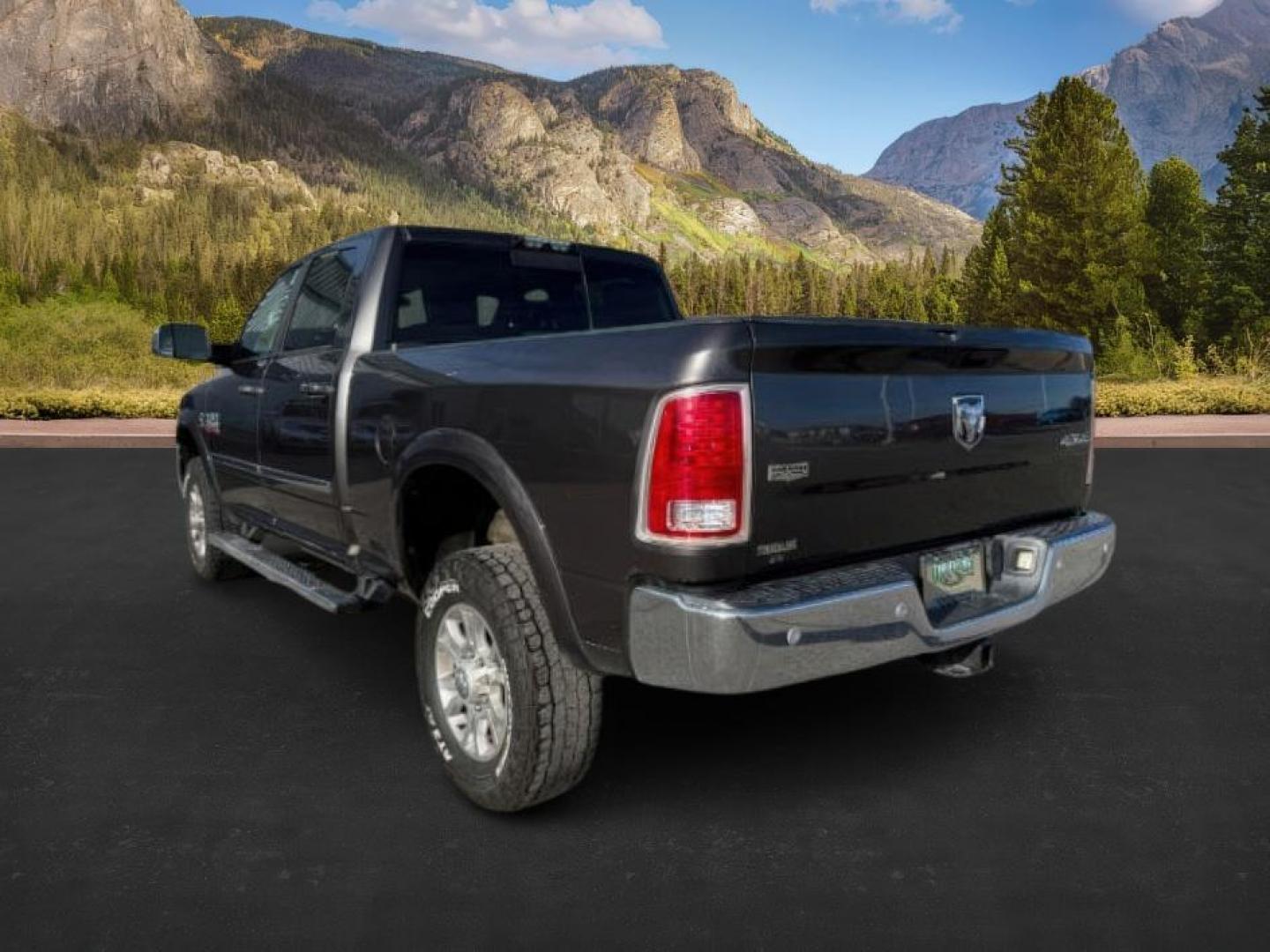 2016 GRAY /Black Ram 2500 (3C6UR5FL2GG) with an Cummins 67L I-6 diesel direct injection engine, Automatic transmission, located at 1175 N Woodruff Ave, Idaho Falls, ID, 83401, 43.506901, -111.999657 - At Timberline Auto, finding a great deal on your next vehicle is always easy! Our experienced sales staff's goal is to help find you the right vehicle at the right price! Our knowledgeable finance department has options for almost any credit score. We offer extended service contract options to prote - Photo#2