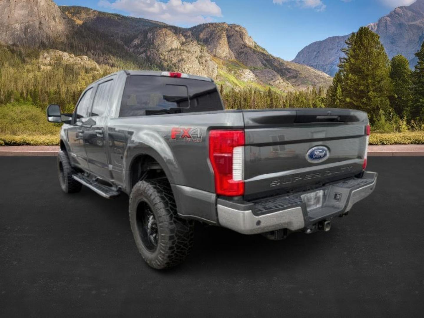 2019 GRAY /Black Ford F-350 (1FT8W3BT2KE) with an Powerstroke 67L V-8 diesel direct injection engine, Automatic transmission, located at 1175 N Woodruff Ave, Idaho Falls, ID, 83401, 43.506901, -111.999657 - At Timberline Auto, finding a great deal on your next vehicle is always easy! Our experienced sales staff's goal is to help find you the right vehicle at the right price! Our knowledgeable finance department has options for almost any credit score. We offer extended service contract options to prote - Photo#2