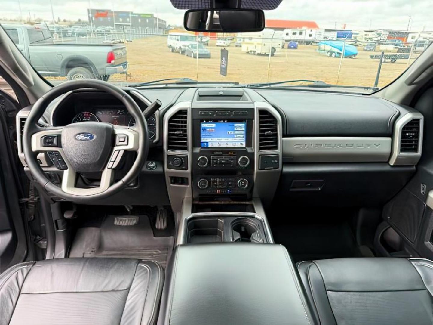 2019 GRAY /Black Ford F-350 (1FT8W3BT2KE) with an Powerstroke 67L V-8 diesel direct injection engine, Automatic transmission, located at 1175 N Woodruff Ave, Idaho Falls, ID, 83401, 43.506901, -111.999657 - At Timberline Auto, finding a great deal on your next vehicle is always easy! Our experienced sales staff's goal is to help find you the right vehicle at the right price! Our knowledgeable finance department has options for almost any credit score. We offer extended service contract options to prote - Photo#22