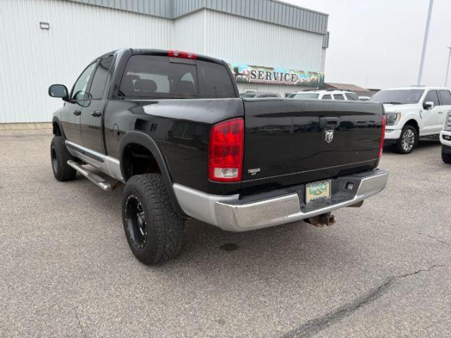 2006 BLACK /Medium Slate Gray Dodge Ram 2500 (1D7KS28C96J) with an Cummins 59L I-6 diesel direct injection engine, Automatic transmission, located at 1175 N Woodruff Ave, Idaho Falls, ID, 83401, 43.506901, -111.999657 - At Timberline Auto, finding a great deal on your next vehicle is always easy! Our experienced sales staff's goal is to help find you the right vehicle at the right price! Our knowledgeable finance department has options for almost any credit score. We offer extended service contract options to prote - Photo#2