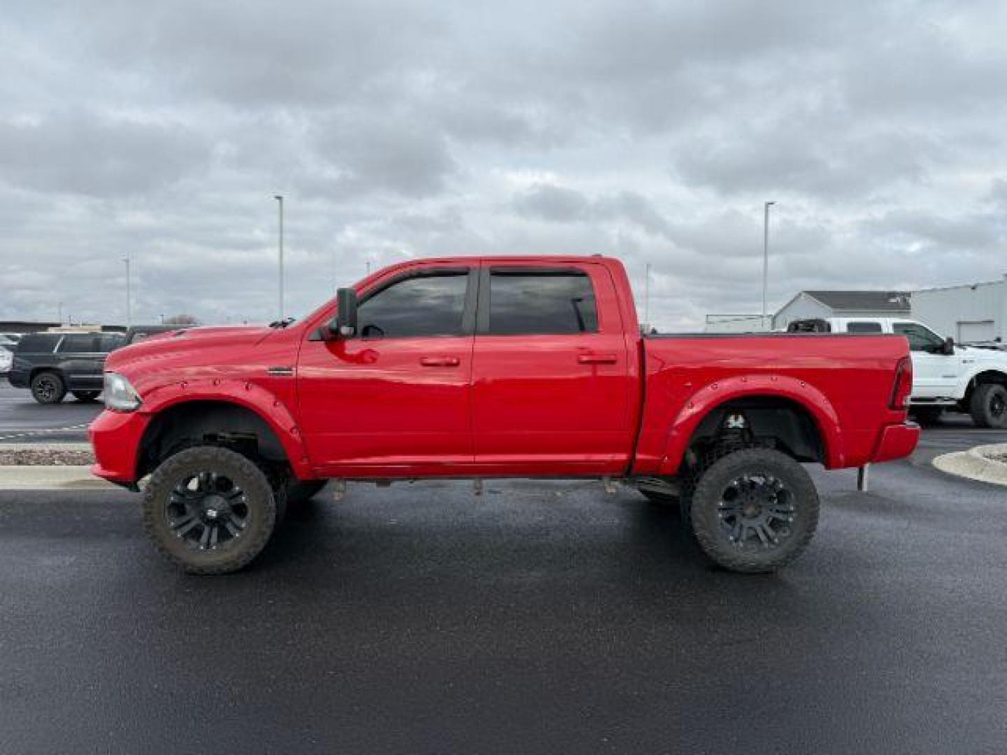 2013 Flame Red Clearcoat /Black Ram 1500 (1C6RR7MT8DS) with an HEMI 57L V-8 variable valve control engine, Automatic transmission, located at 1175 N Woodruff Ave, Idaho Falls, ID, 83401, 43.506901, -111.999657 - At Timberline Auto, finding a great deal on your next vehicle is always easy! Our experienced sales staff's goal is to help find you the right vehicle at the right price! Our knowledgeable finance department has options for almost any credit score. We offer extended service contract options to prote - Photo#1